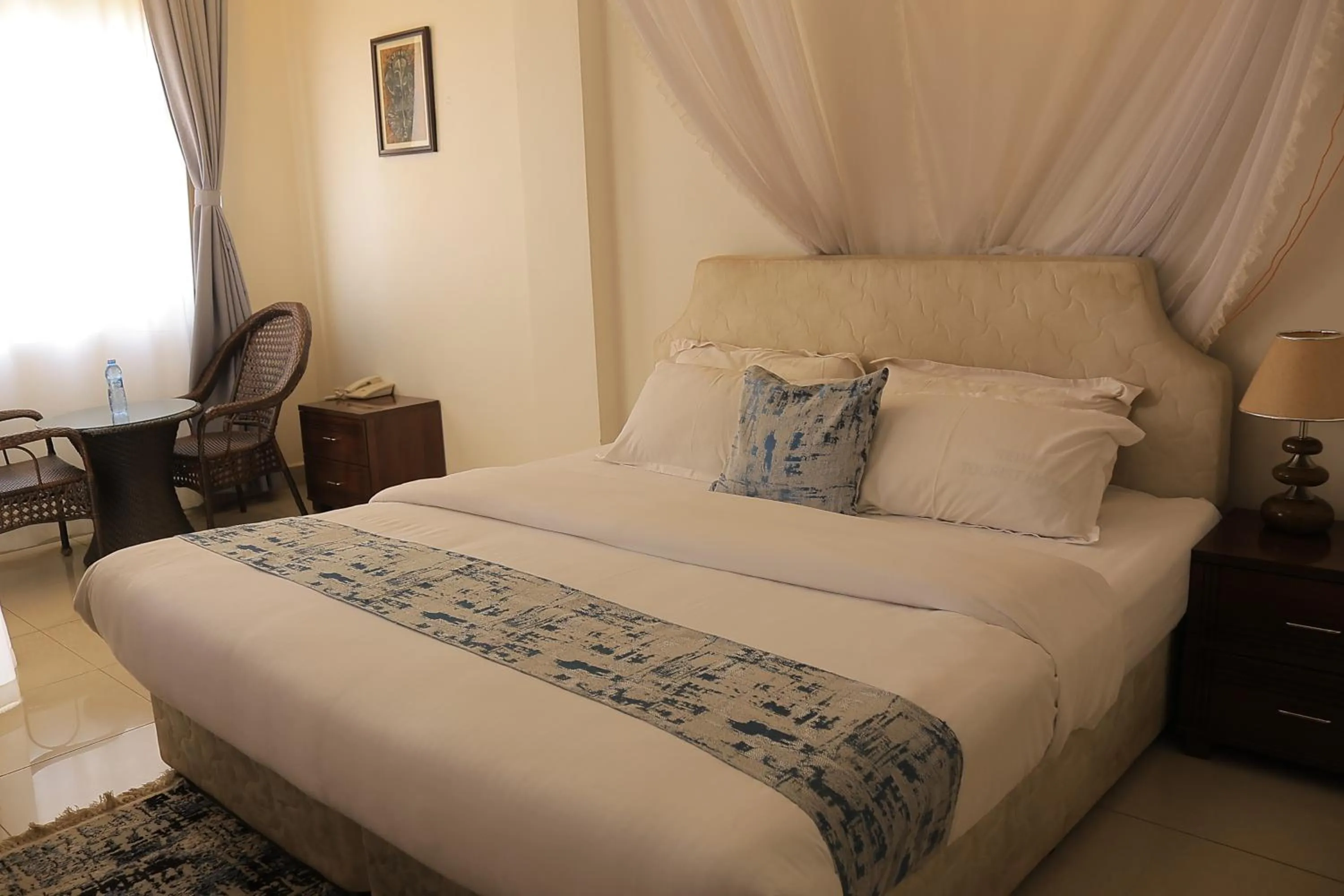 Photo of the whole room, Bed in Reinah Tourist Hotel