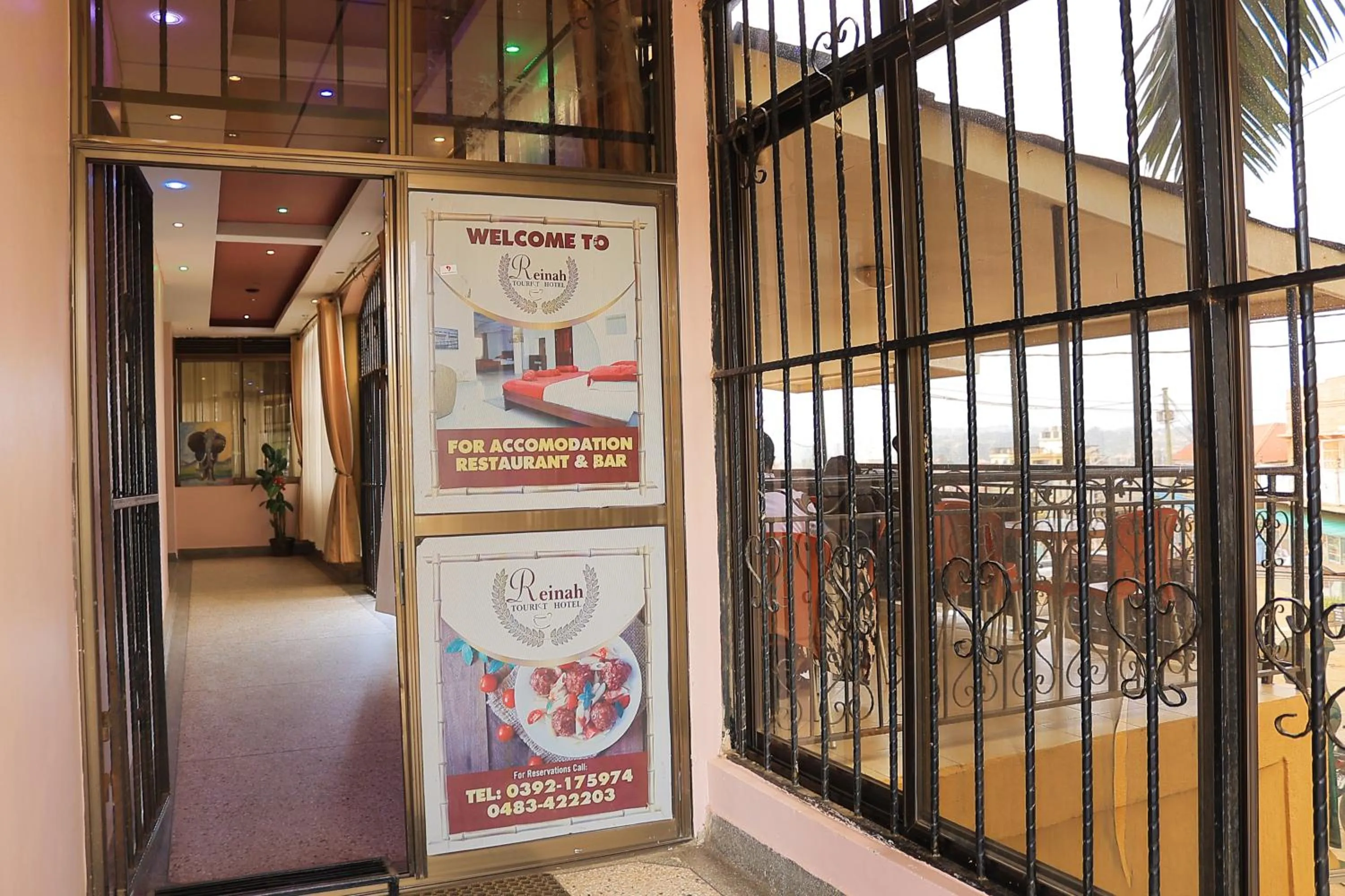 Property logo or sign in Reinah Tourist Hotel