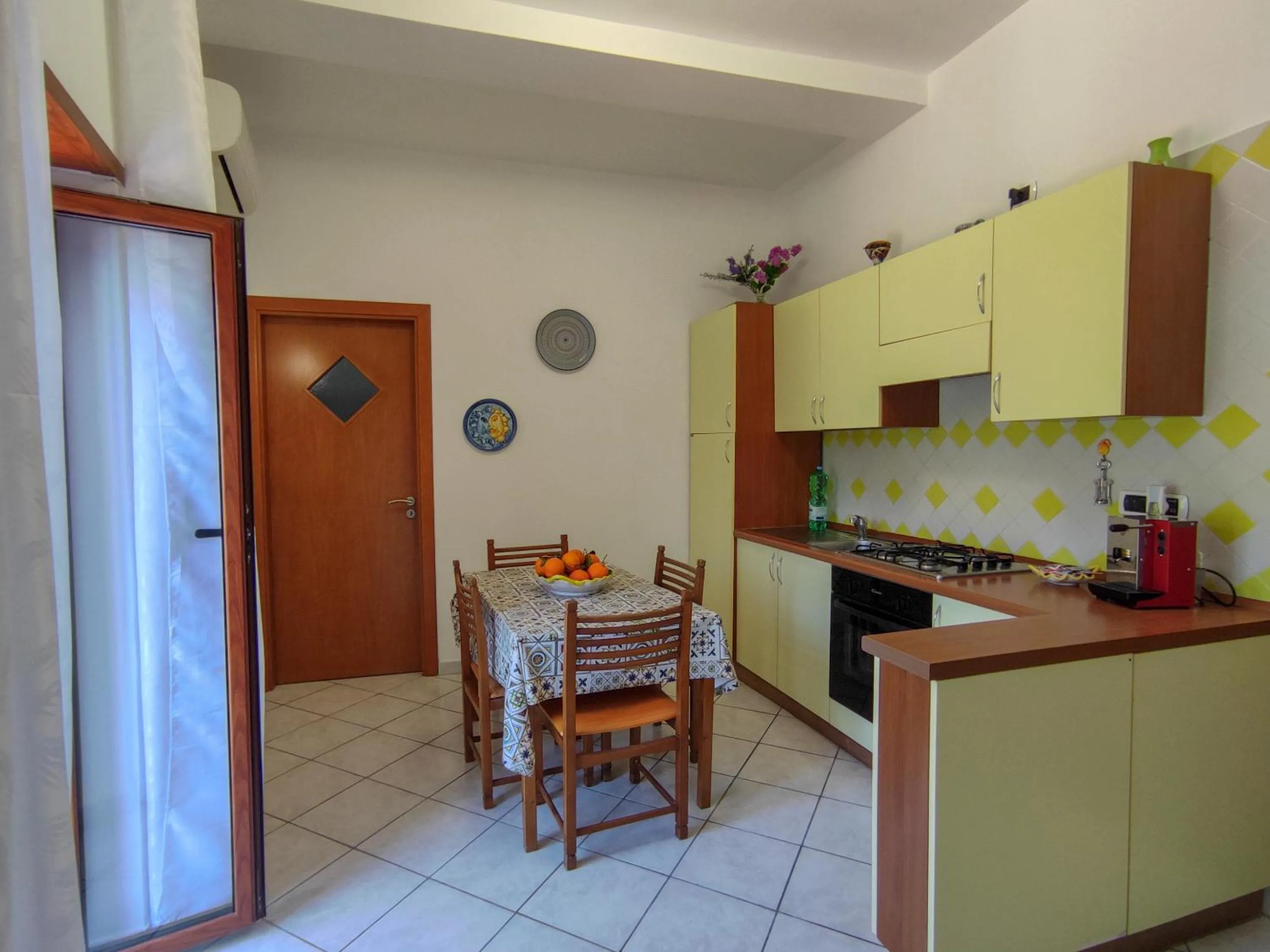Kitchen or kitchenette in B&B Casa Mena
