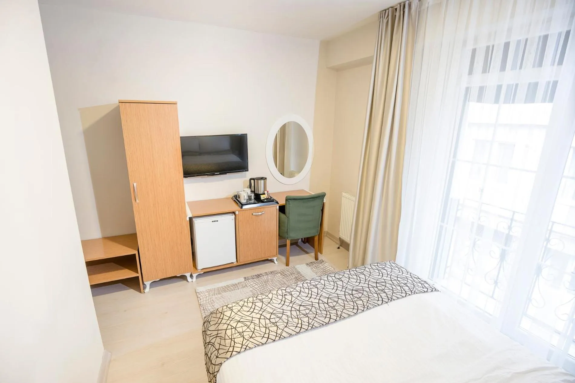 Bed in The Corner Inn Hotels By Suit