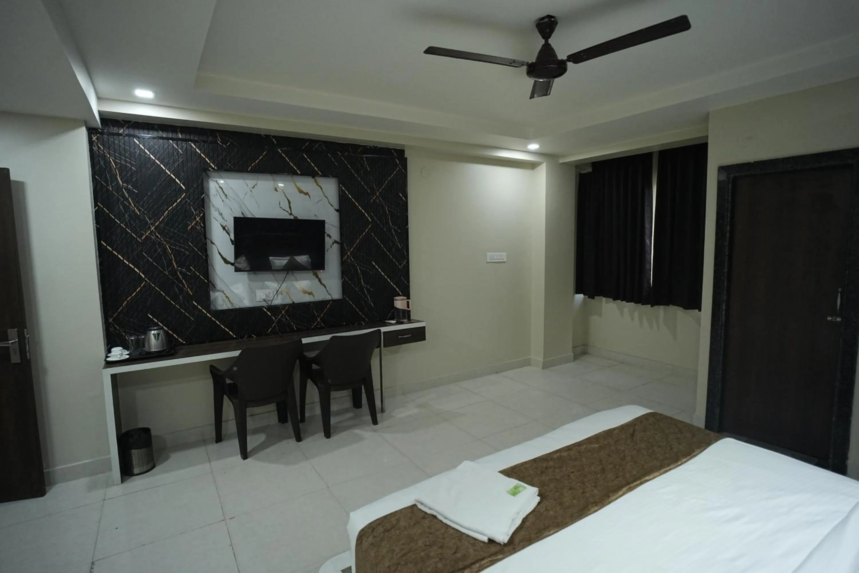 Bed in Hotel Jay Palace