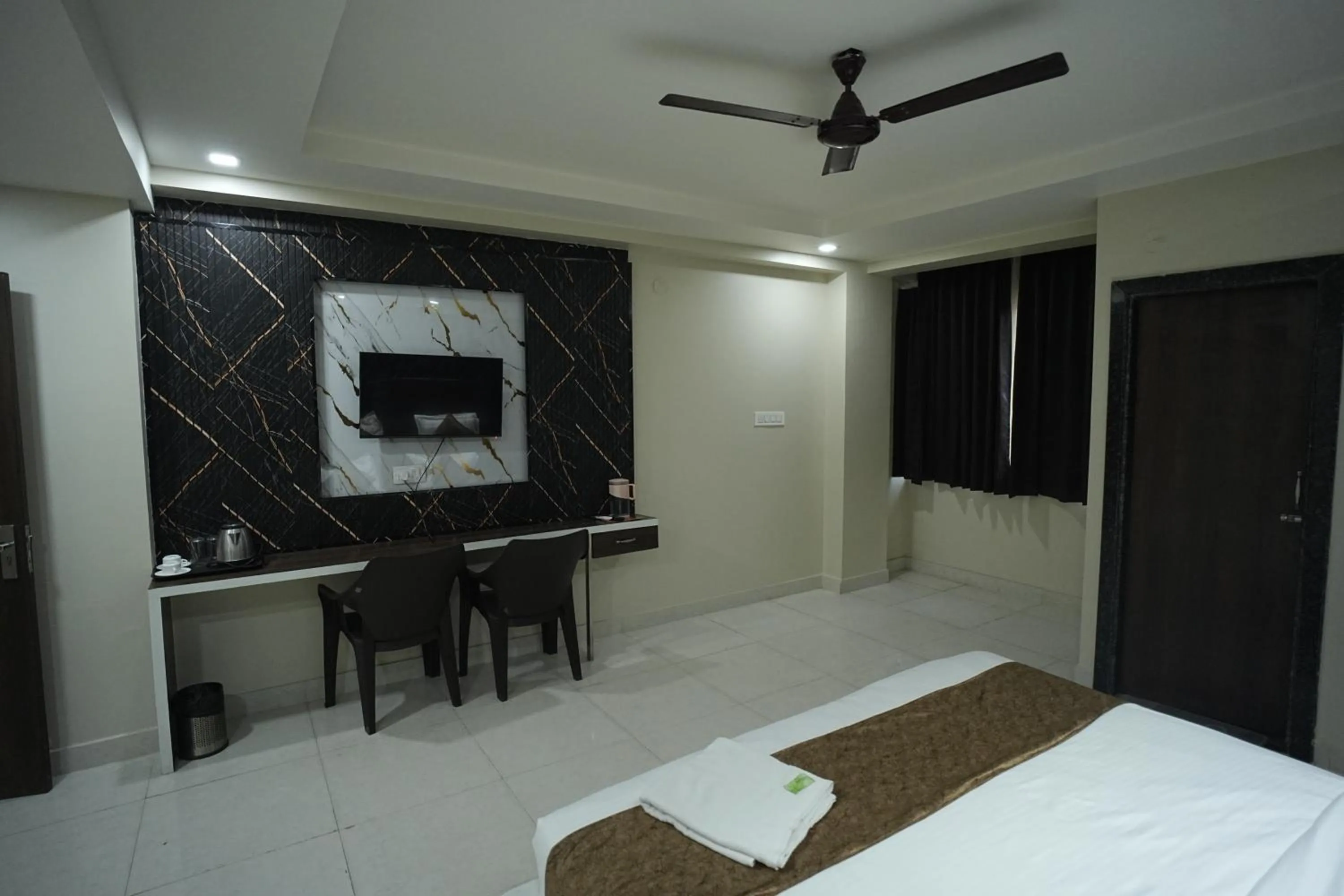 Bed in Hotel Jay Palace