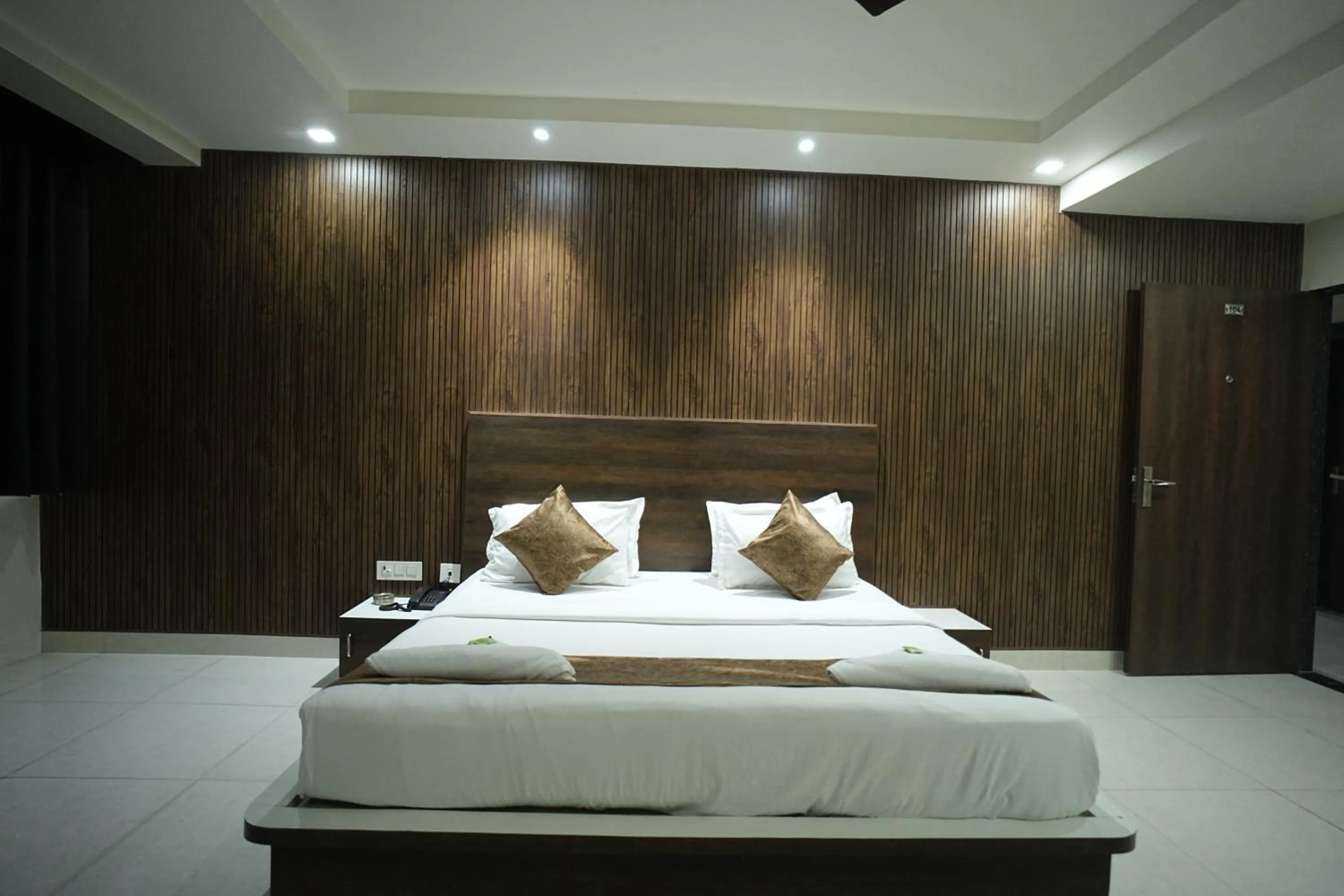 Bed in Hotel Jay Palace