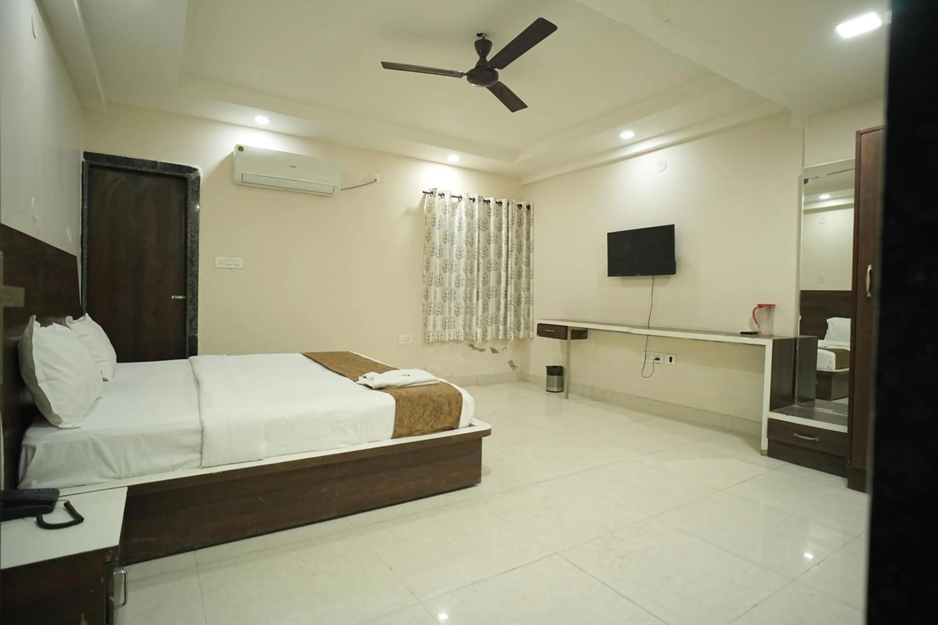Bed in Hotel Jay Palace