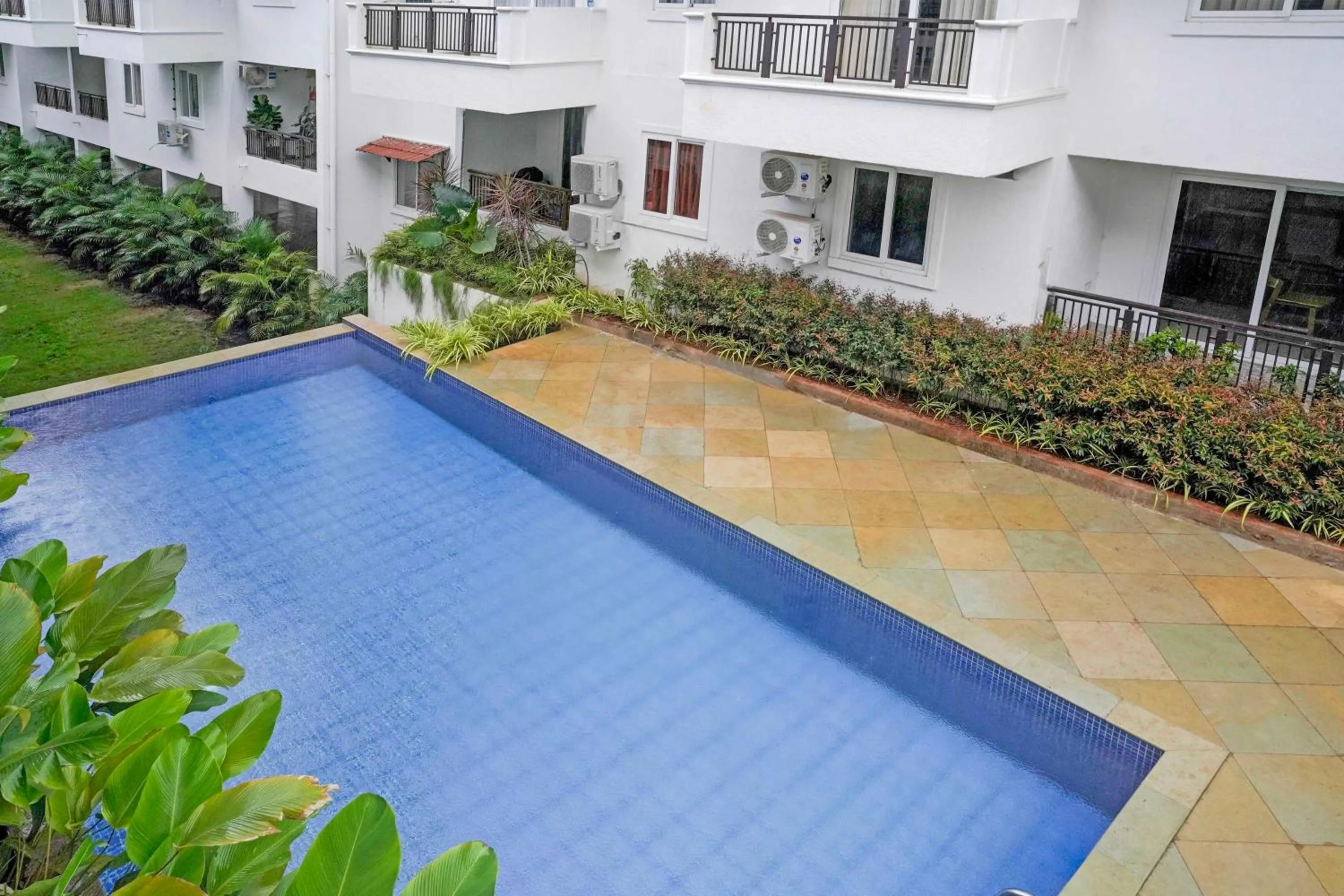Swimming pool in Sereno By Dancenter - 1 BHK Apartment In Siolim