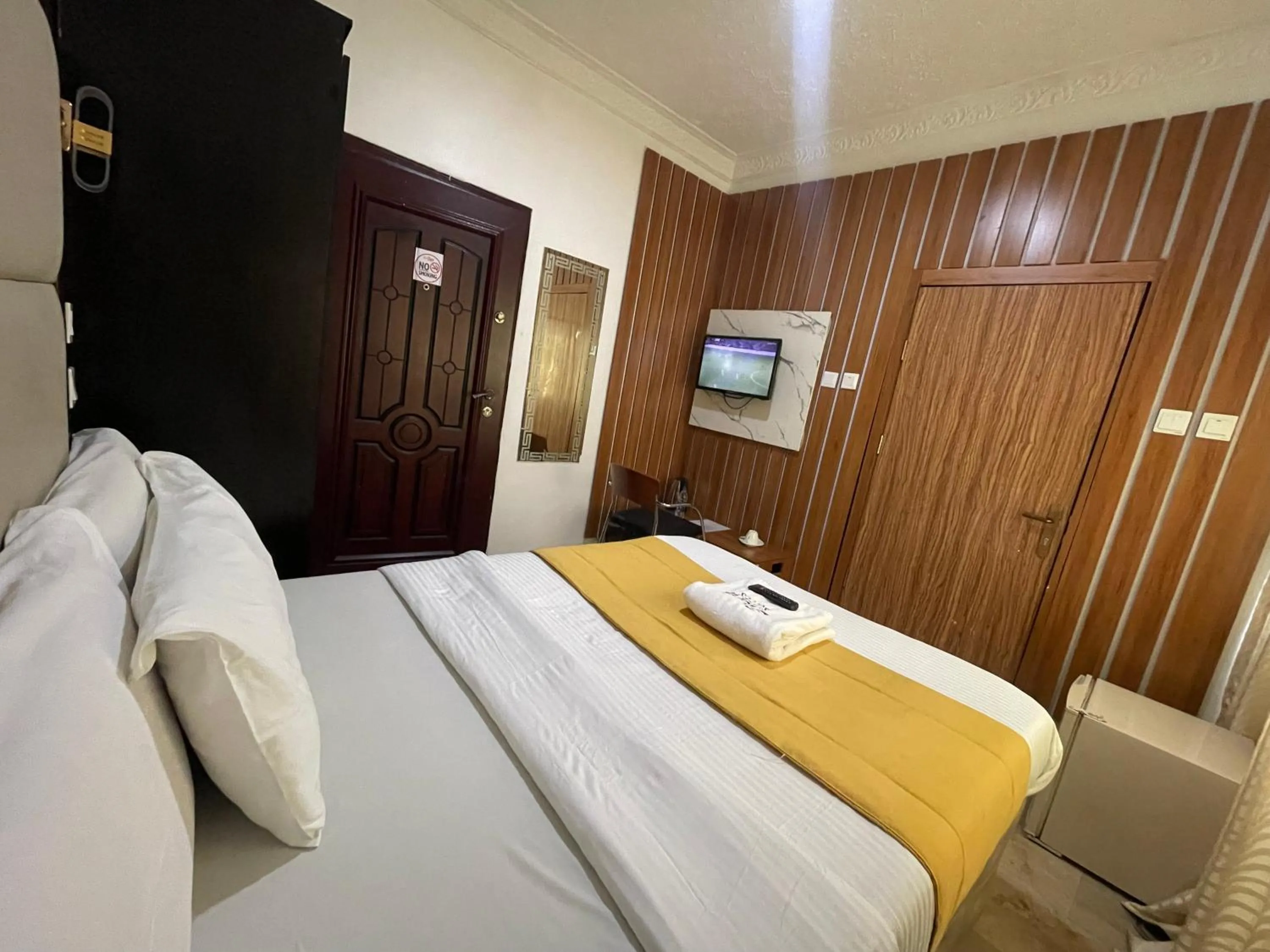 Bed in Flora Suites