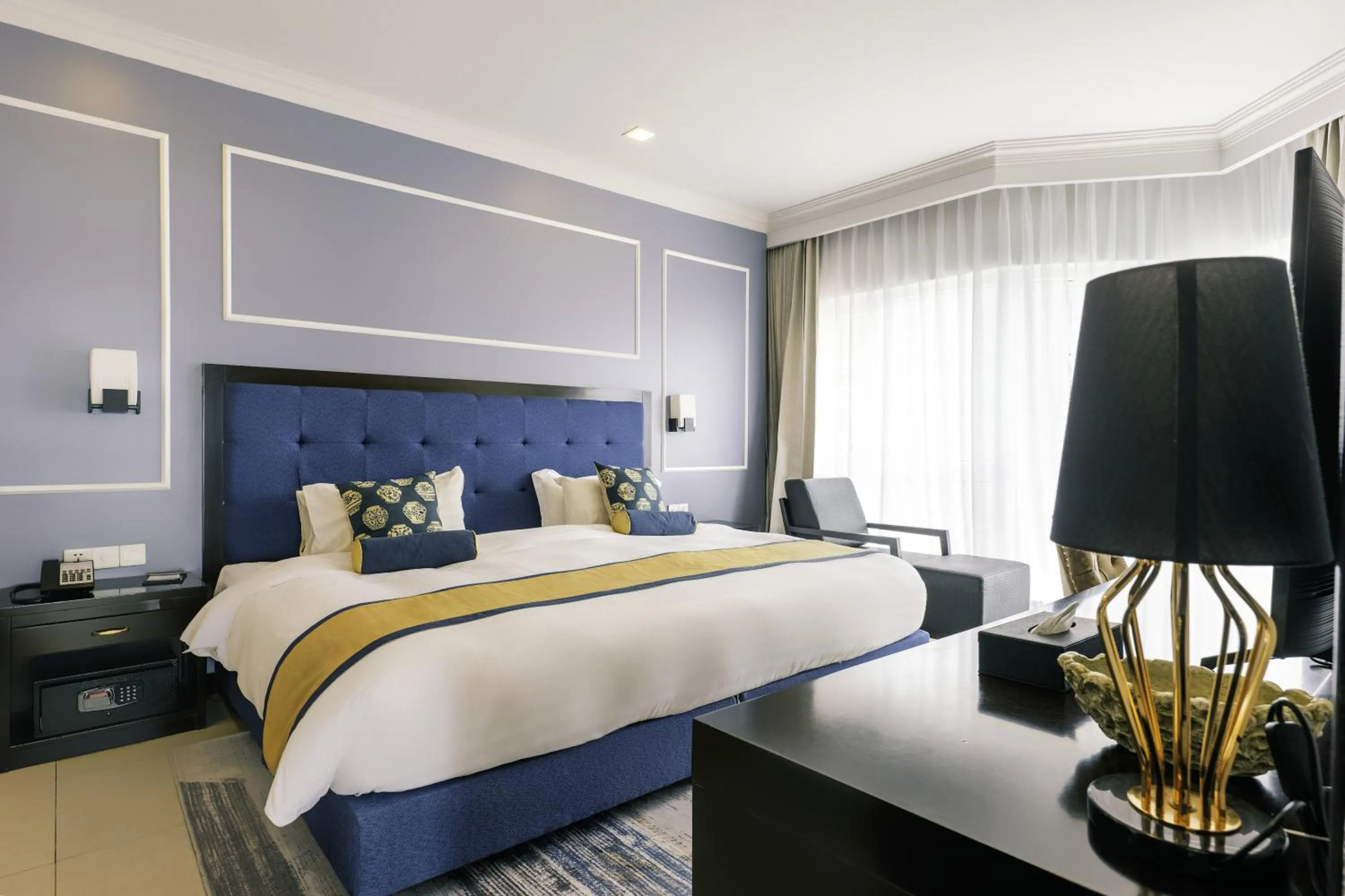 Bed in Queenco Hotel & Casino