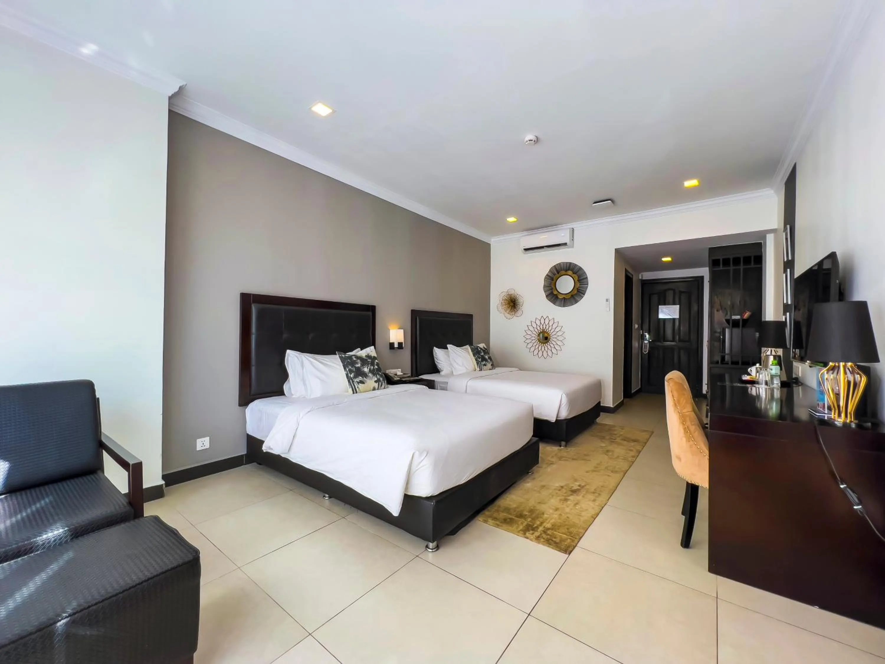 Bed in Queenco Hotel & Casino