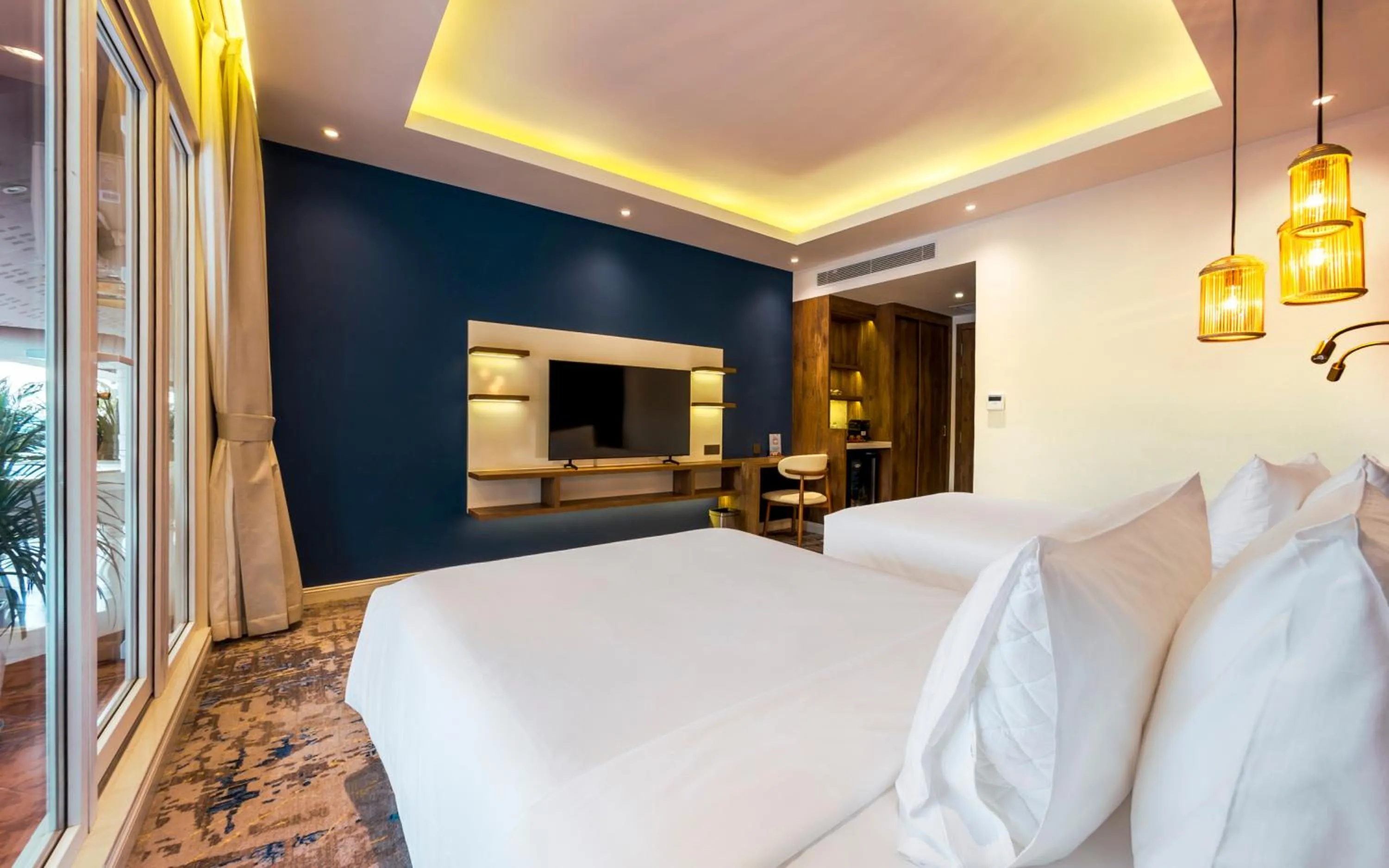 Bed in Queenco Hotel & Casino