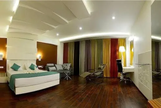 Bed in Hotel Vijay Elanza