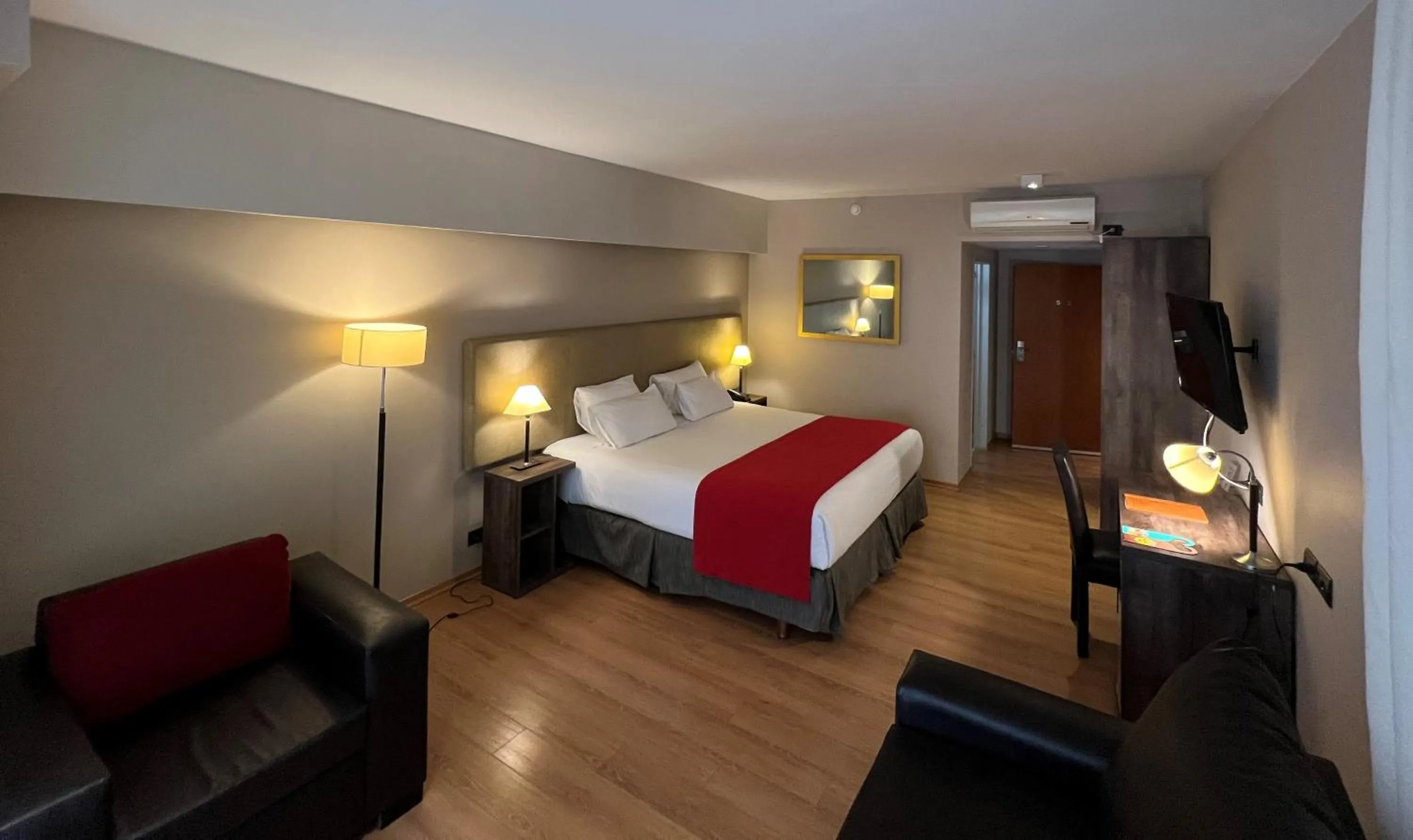 Seating area, Bed in Bue Hotel