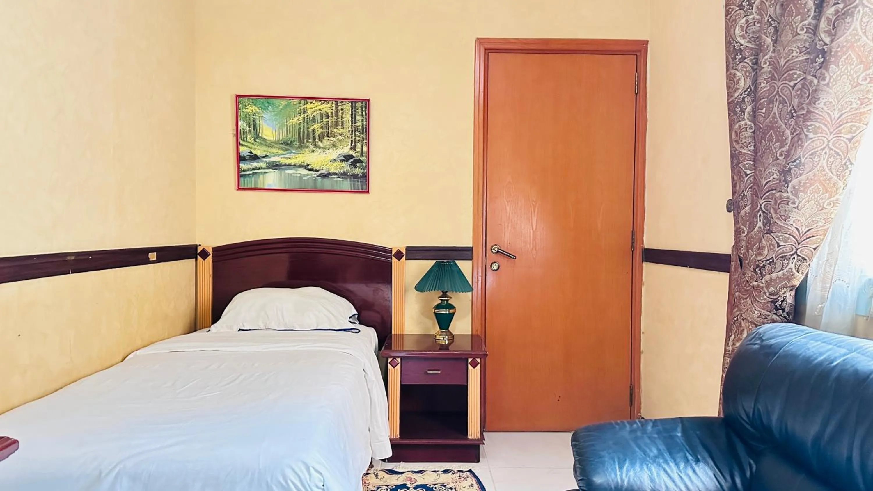 Photo of the whole room, Bed in Collection O San Marino Hotel