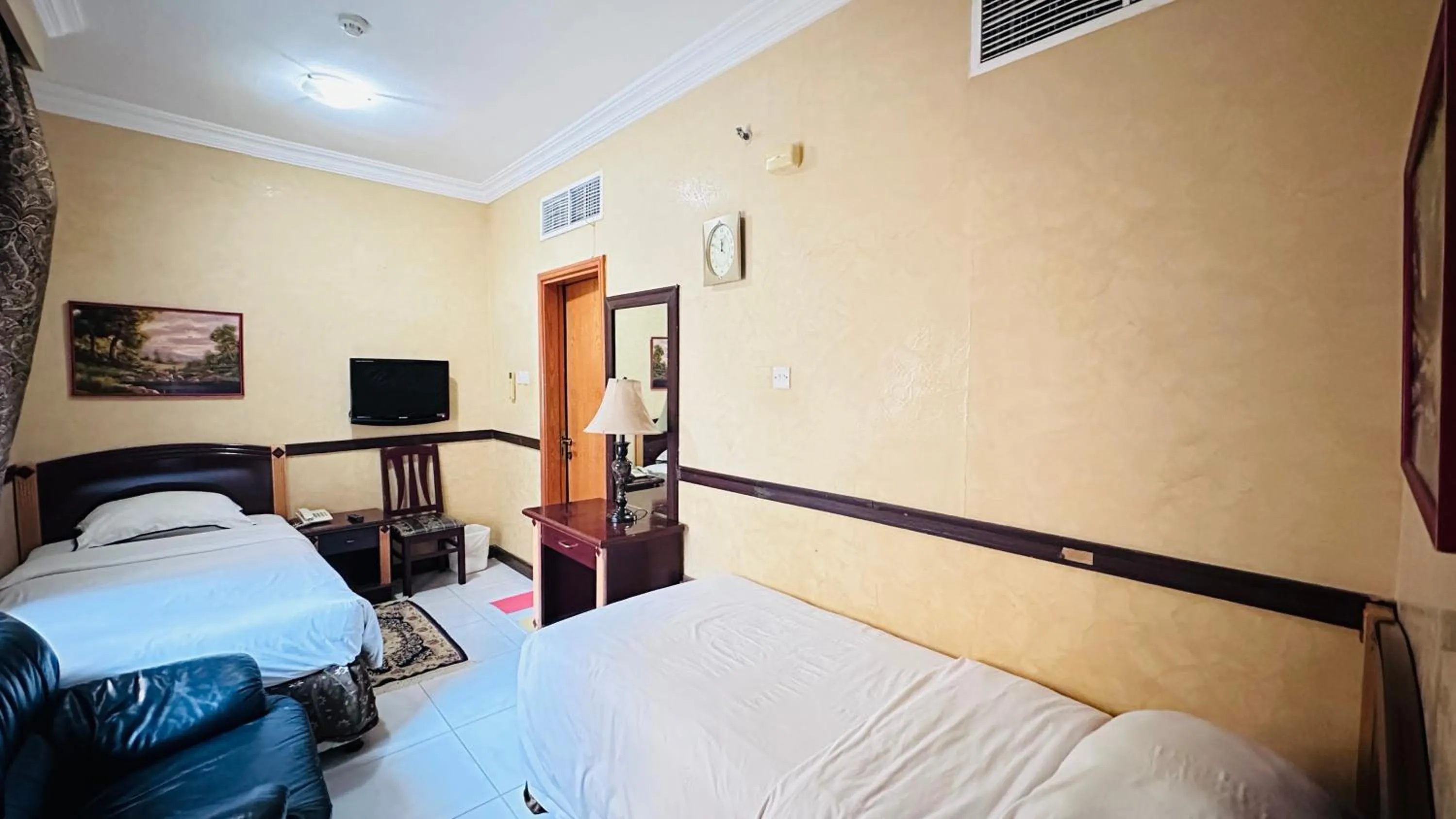 Photo of the whole room, Bed in Collection O San Marino Hotel