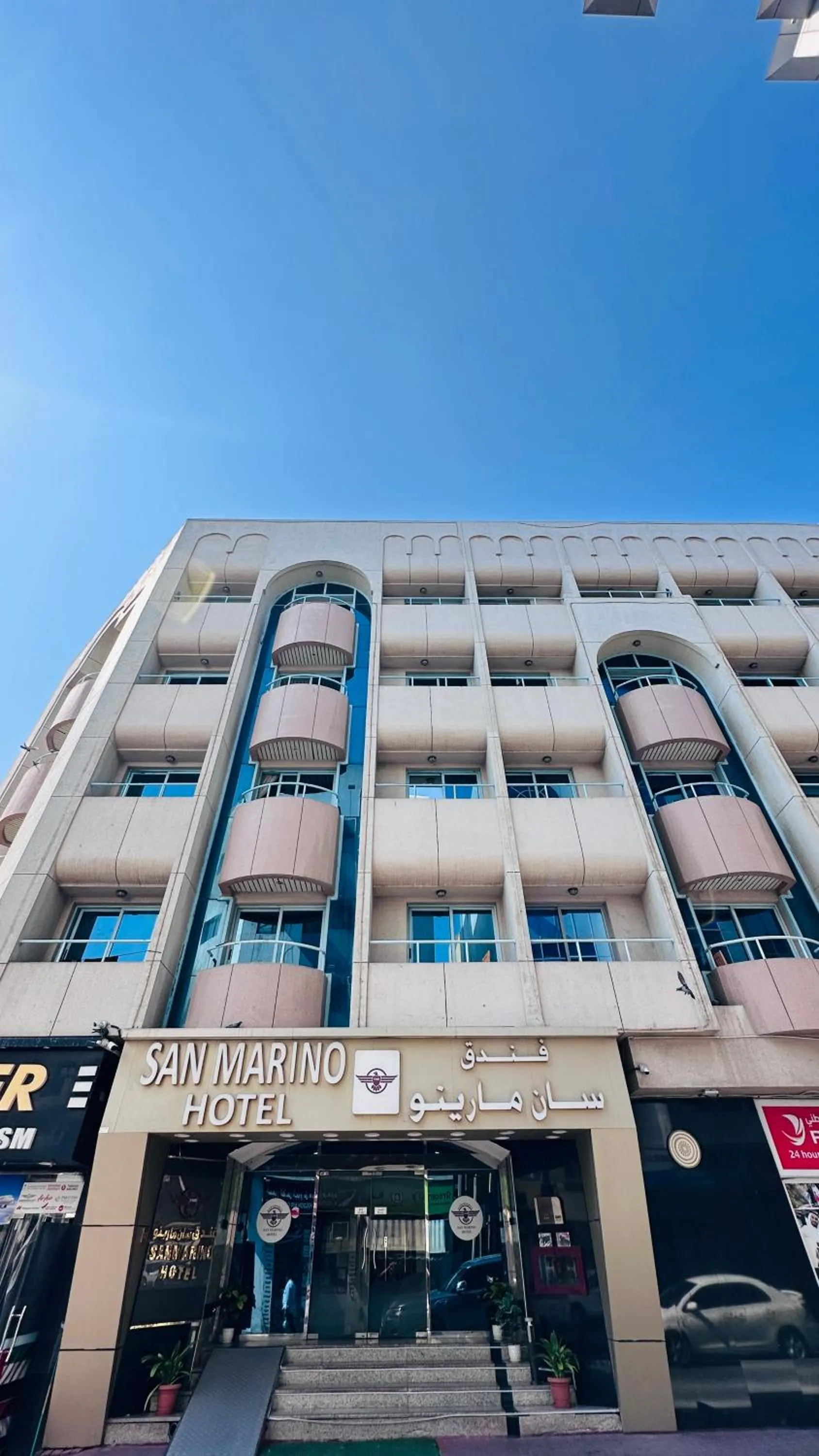 Property building in Collection O San Marino Hotel