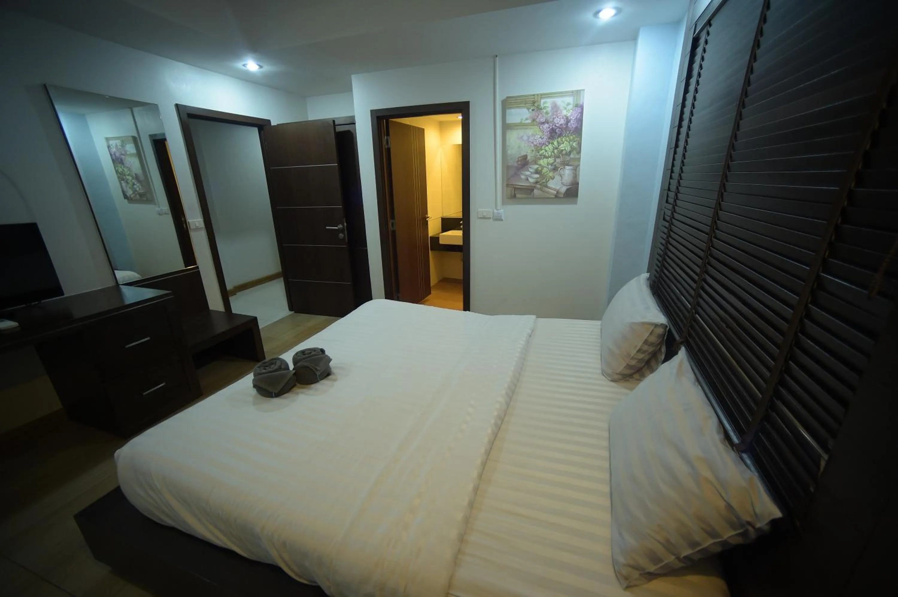 Bathroom, Bed in Villa Navin Beach Residence