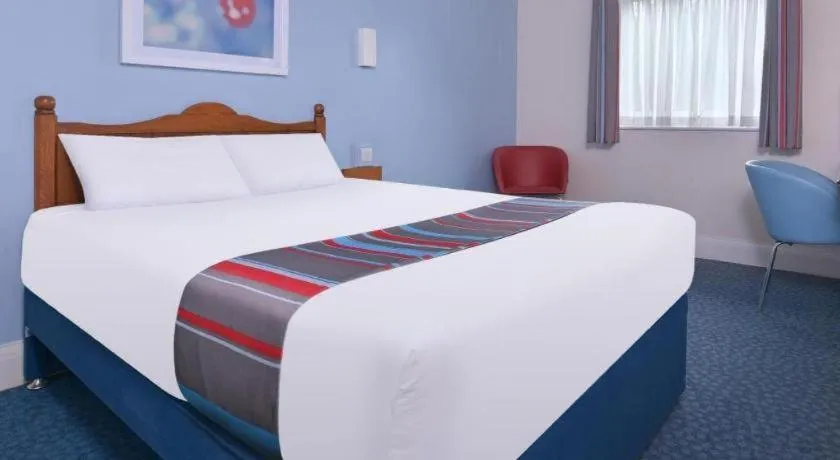 Bed in Travelodge Cardiff Airport
