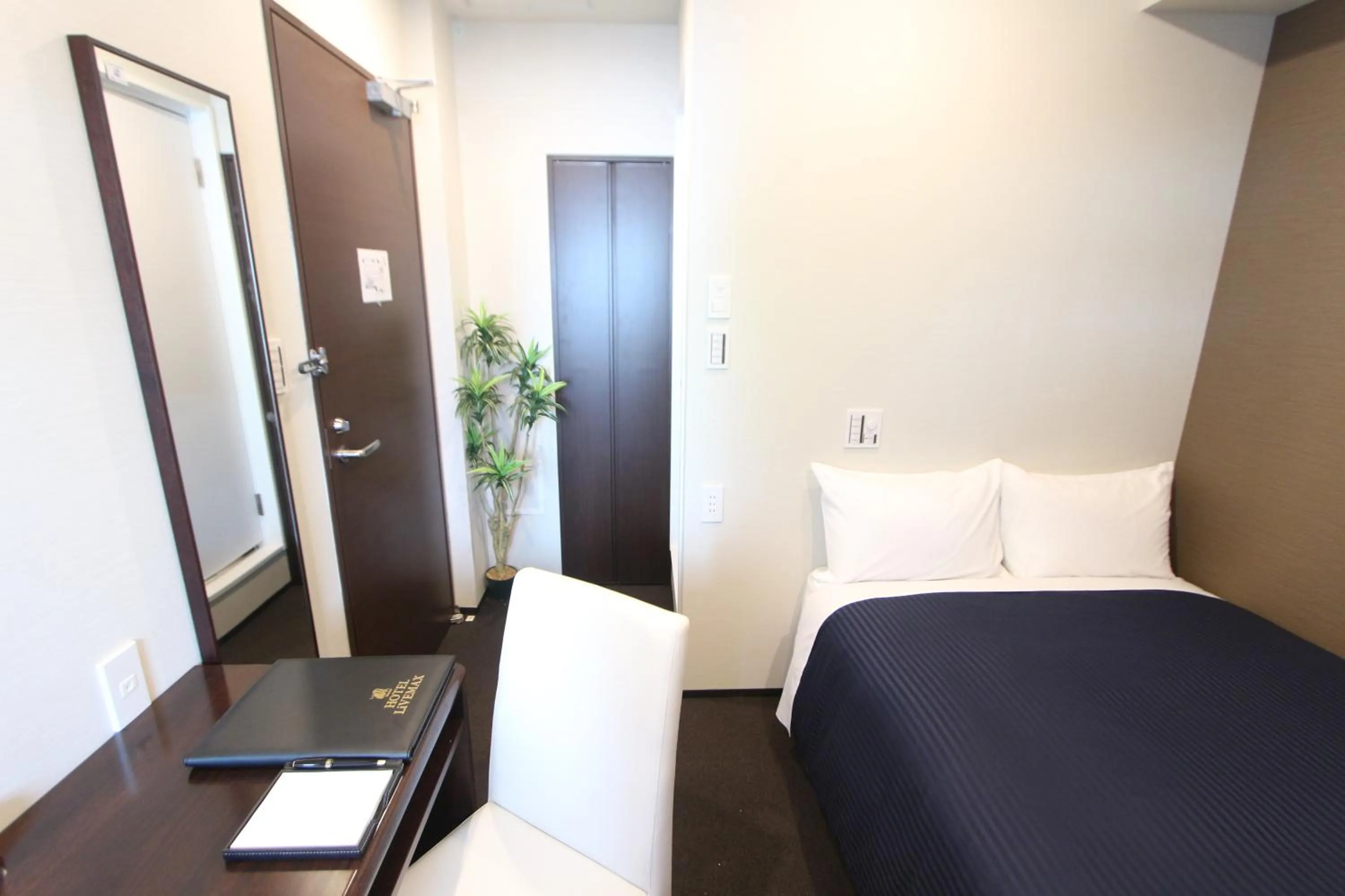 Photo of the whole room, Bed in HOTEL LiVEMAX Higashi Ginza