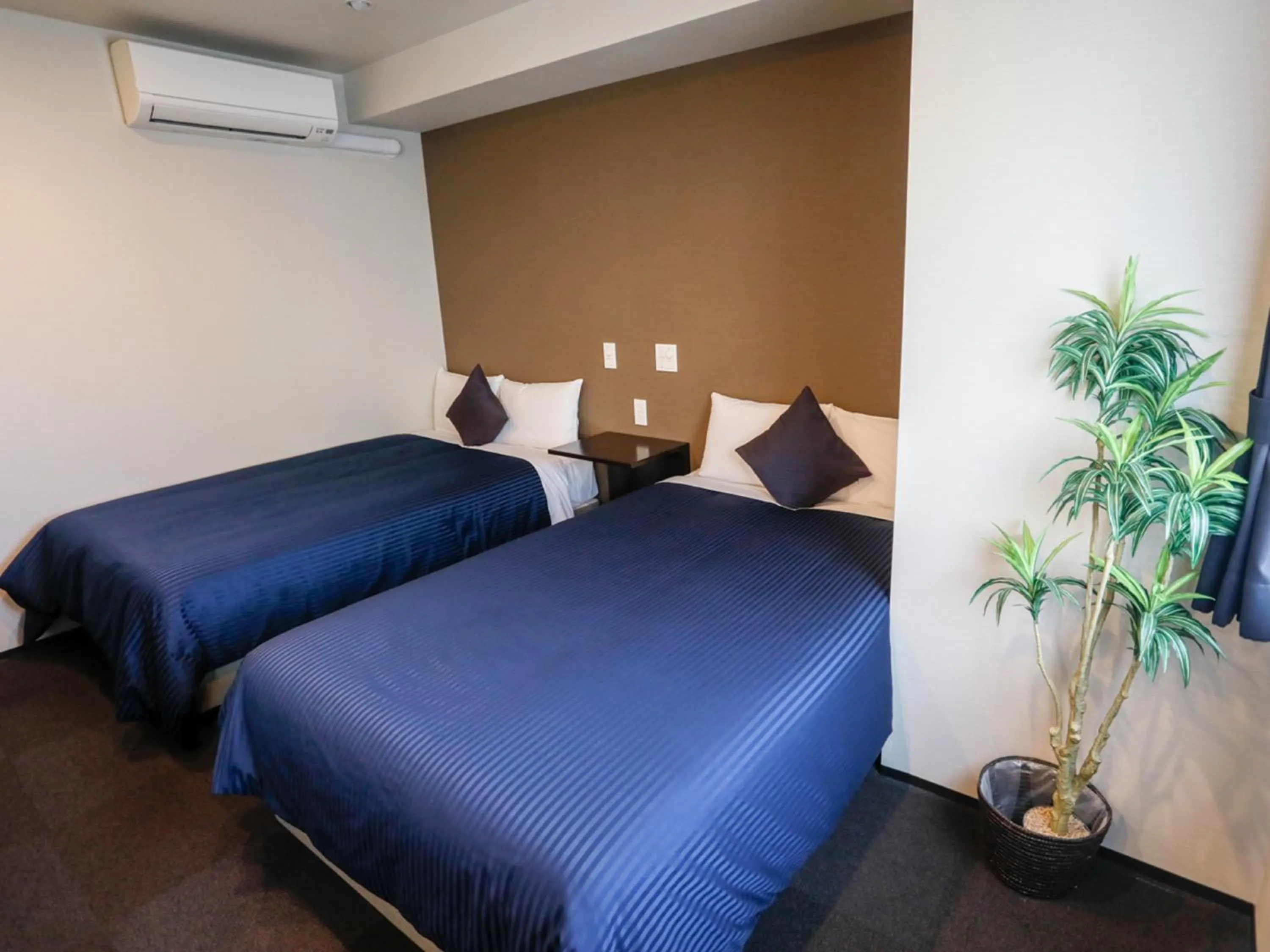 Bed in HOTEL LiVEMAX Higashi Ginza