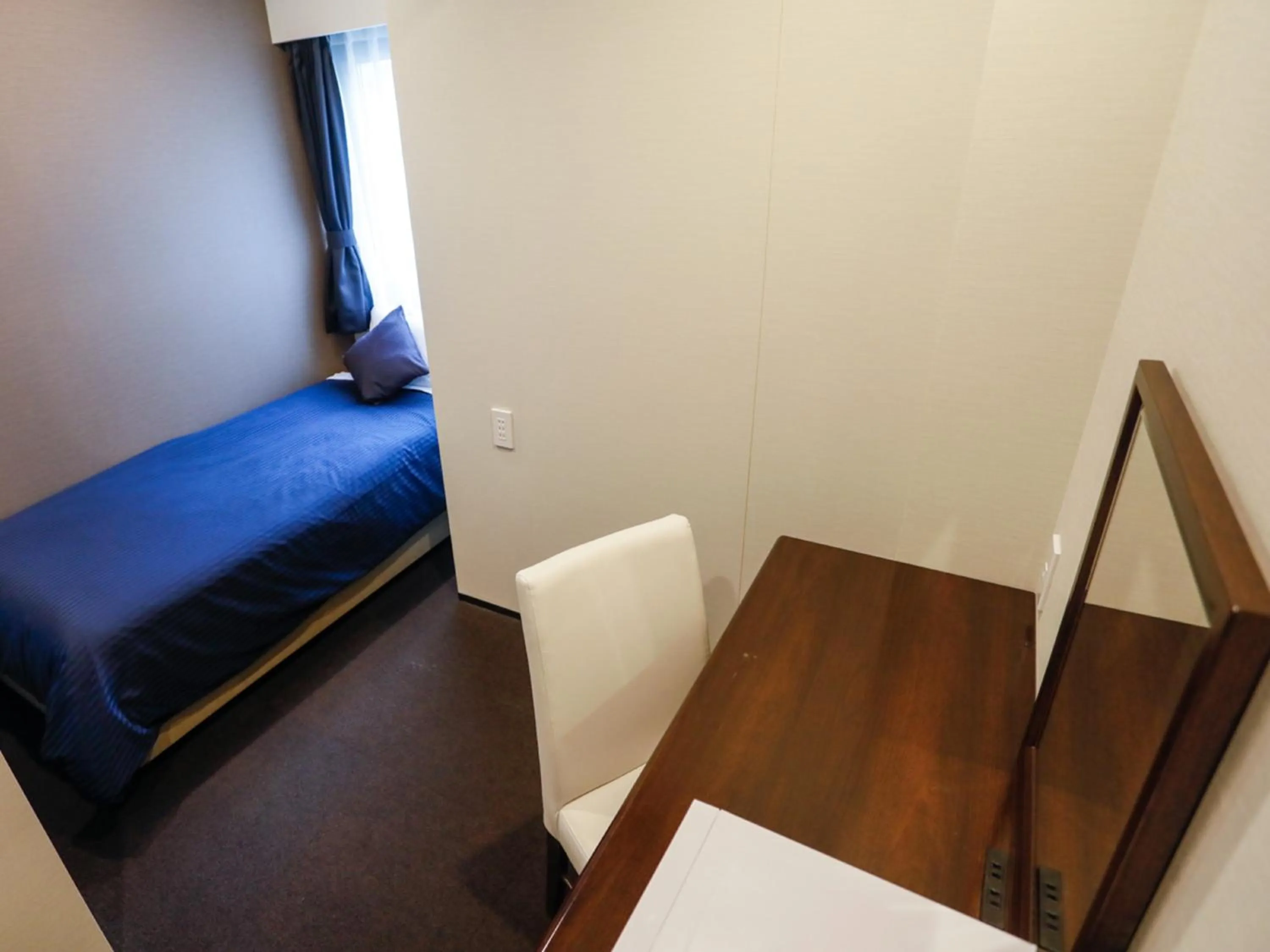 Bed in HOTEL LiVEMAX Higashi Ginza