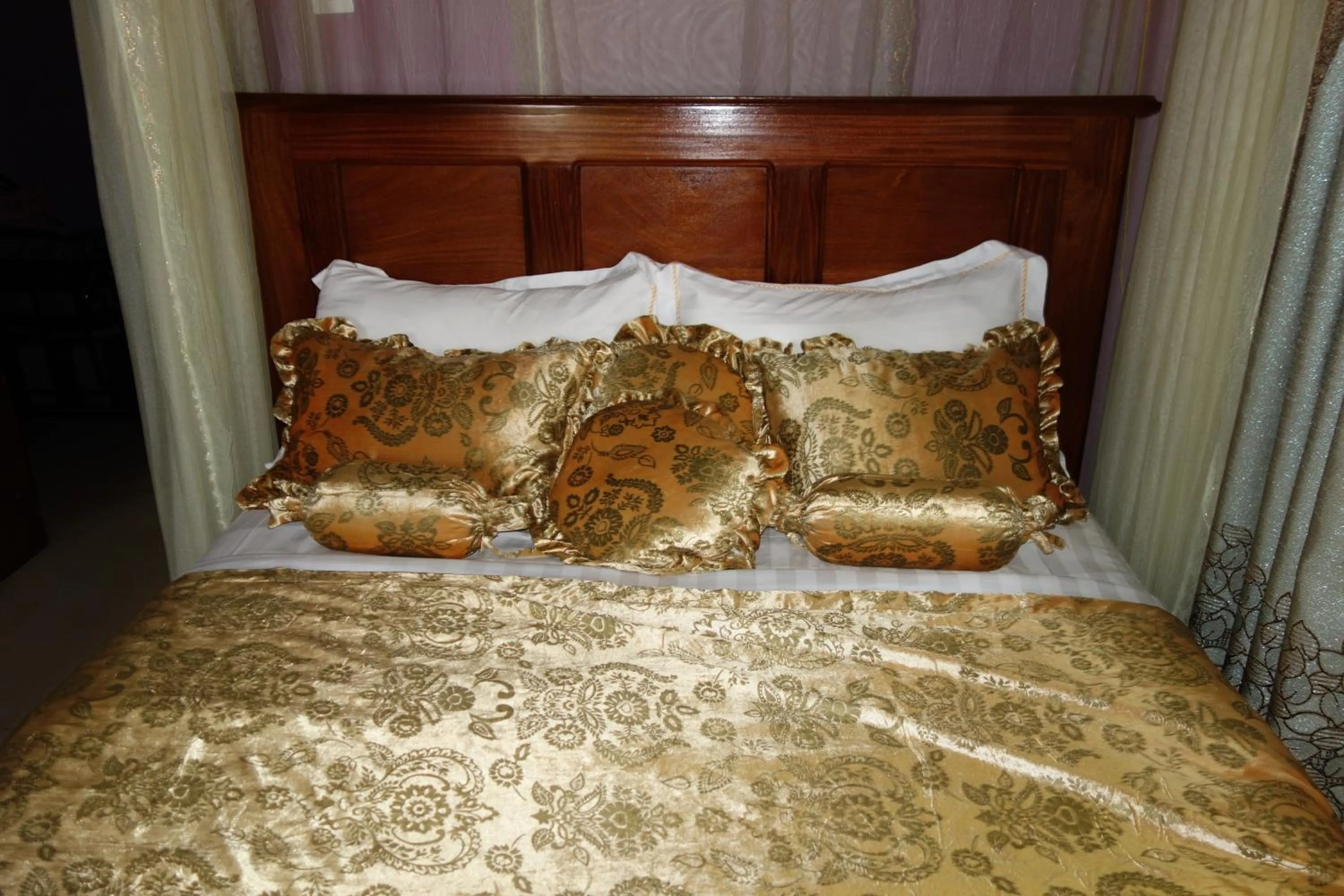 Bed in Impala Suites