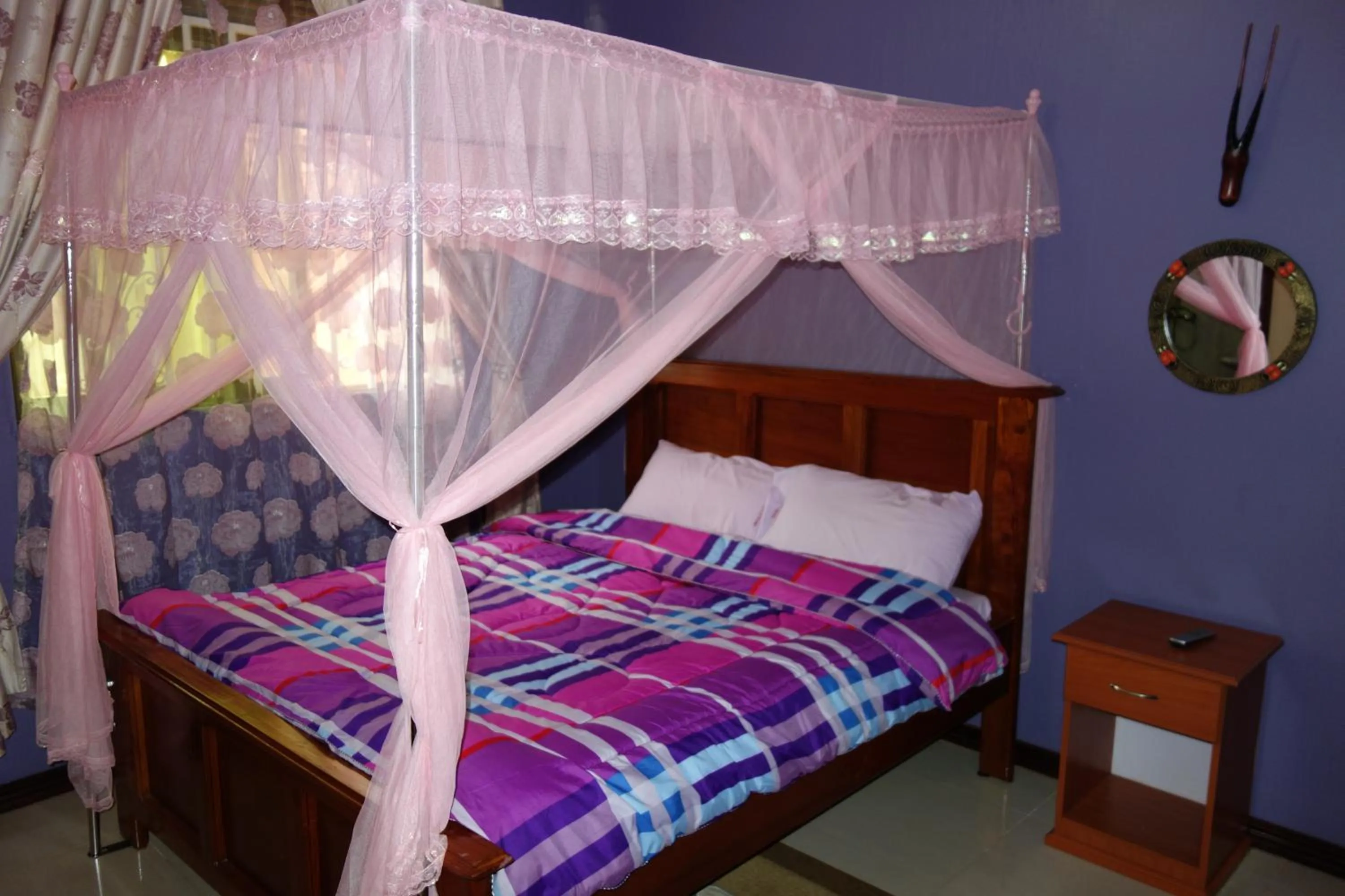 Bed in Impala Suites