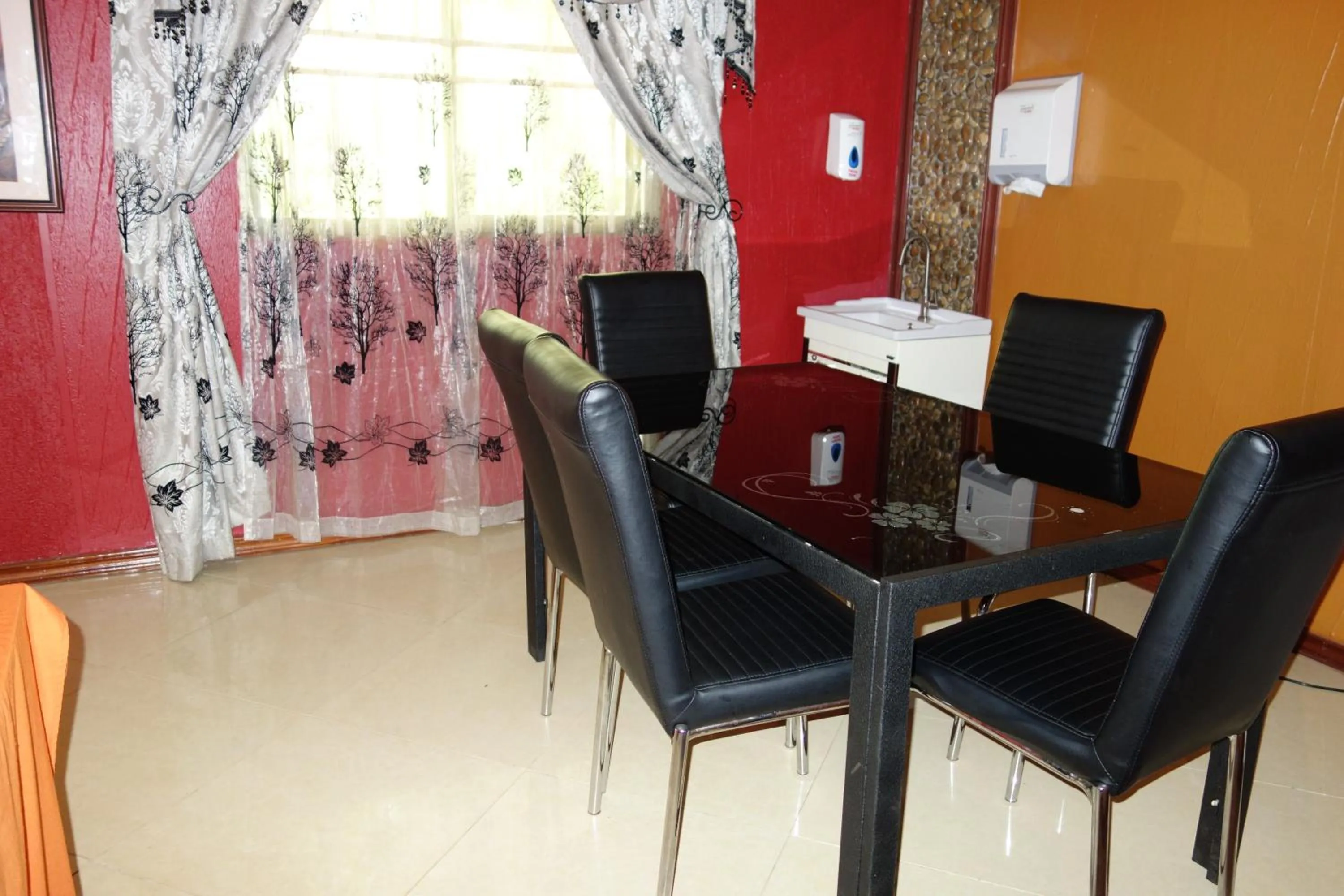 Dining area in Impala Suites