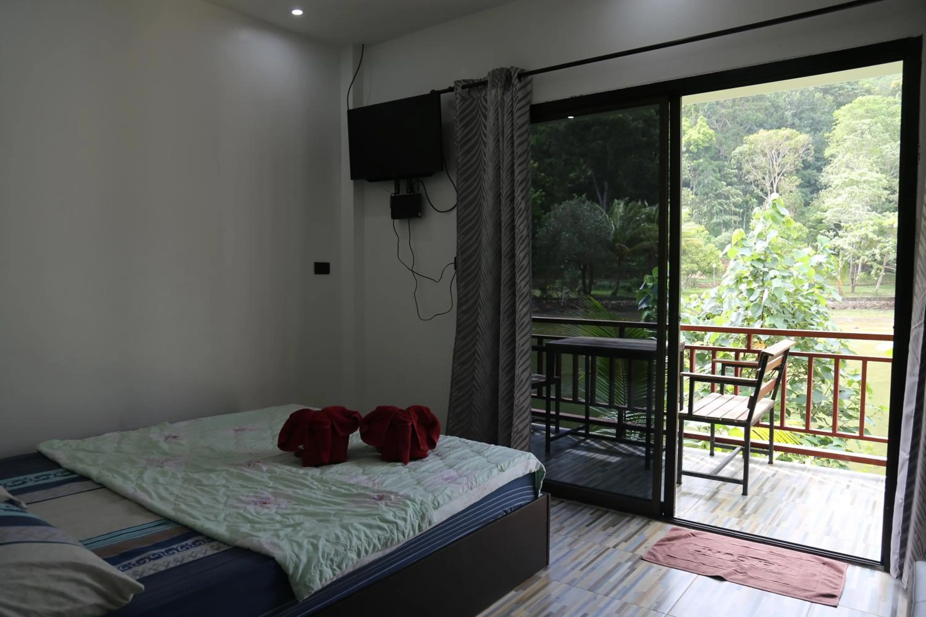 Photo of the whole room, Bed in Yuyu Golden Beach