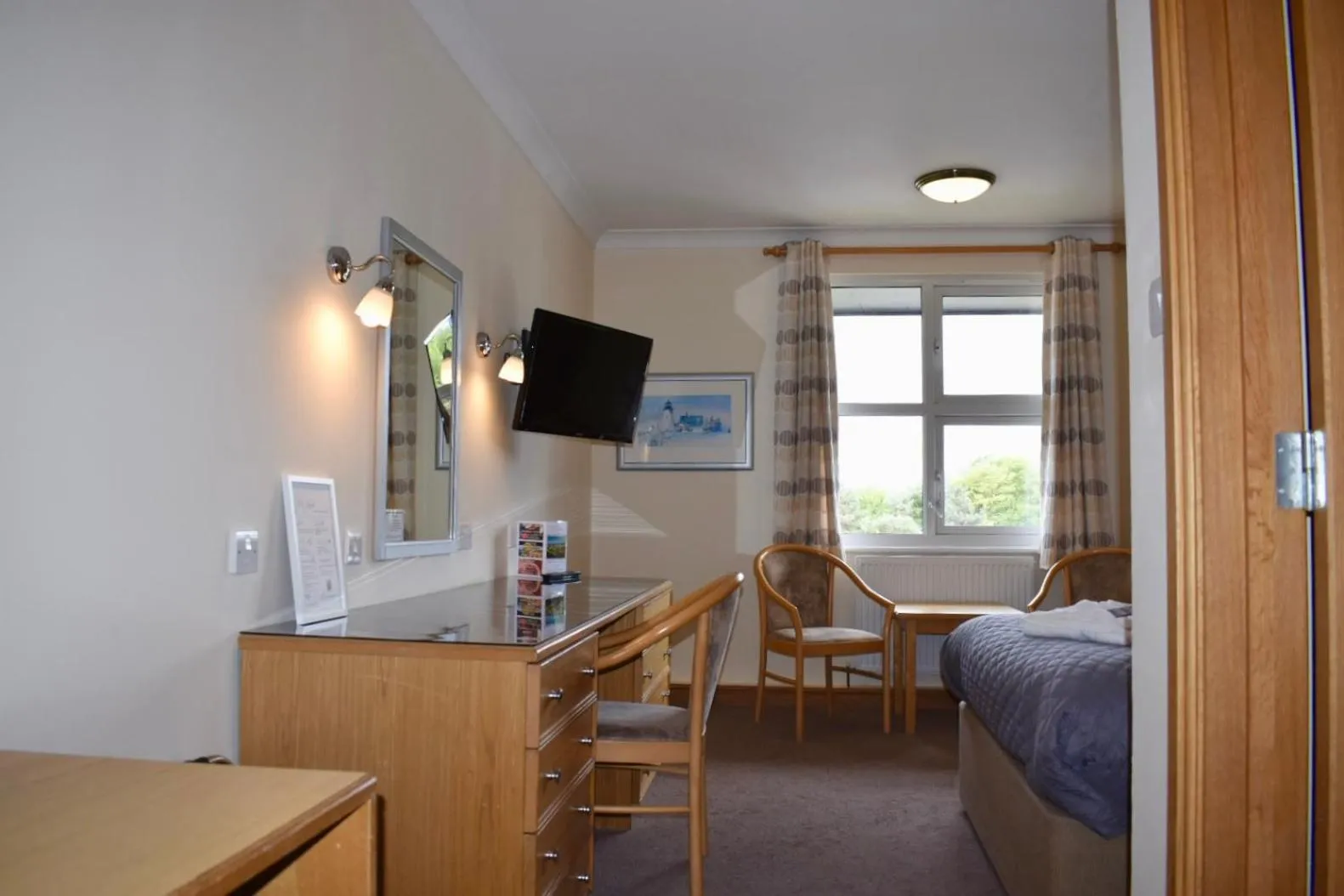 Bed in The Little Haven Hotel On The Beach