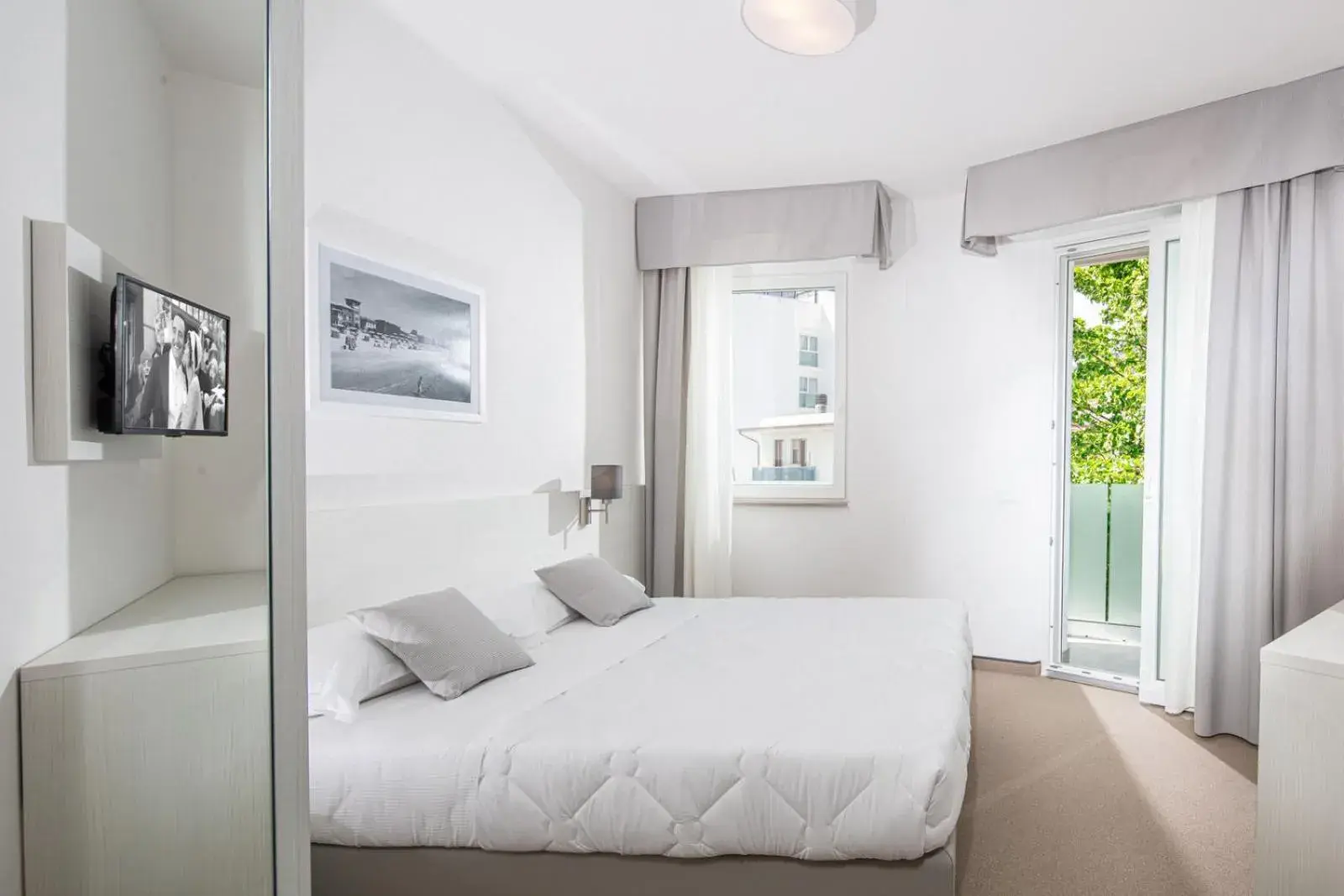 Deluxe Quadruple Room in Hotel Centrale Deluxe Quadruple Room in Hotel Centrale