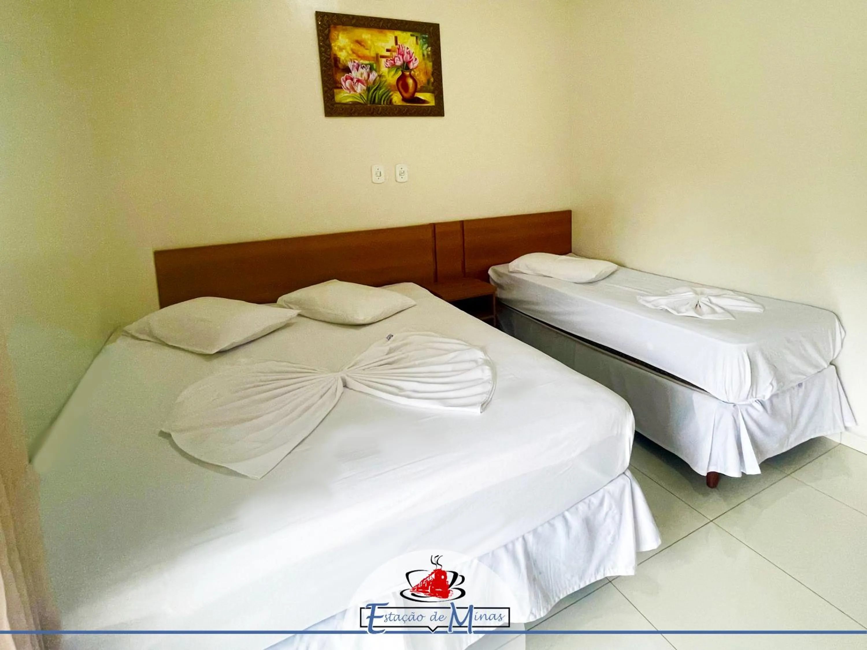 Bed in Hotel Estação de Minas