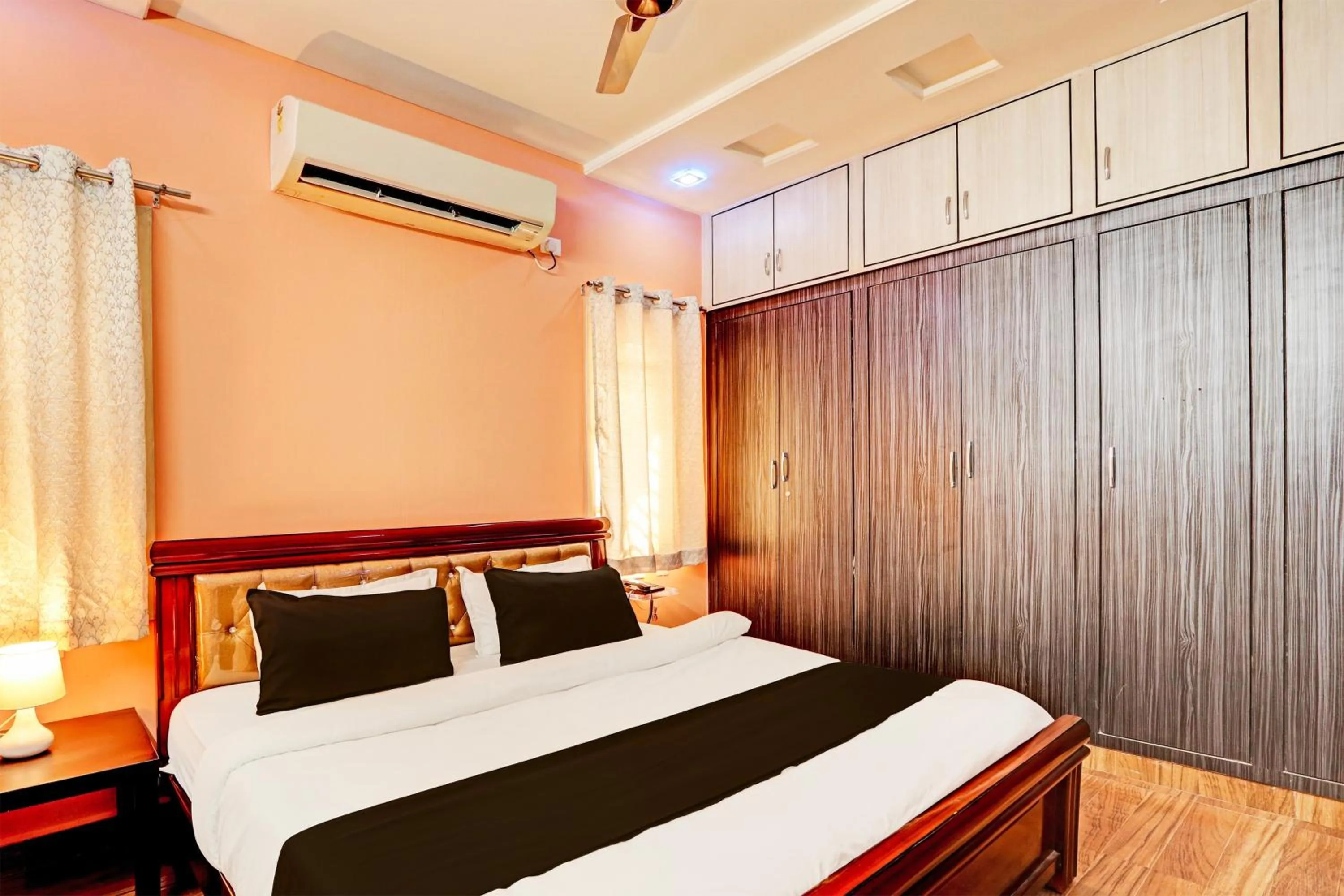 Bedroom, Bed in Super Collection O Q Suites Madhapur