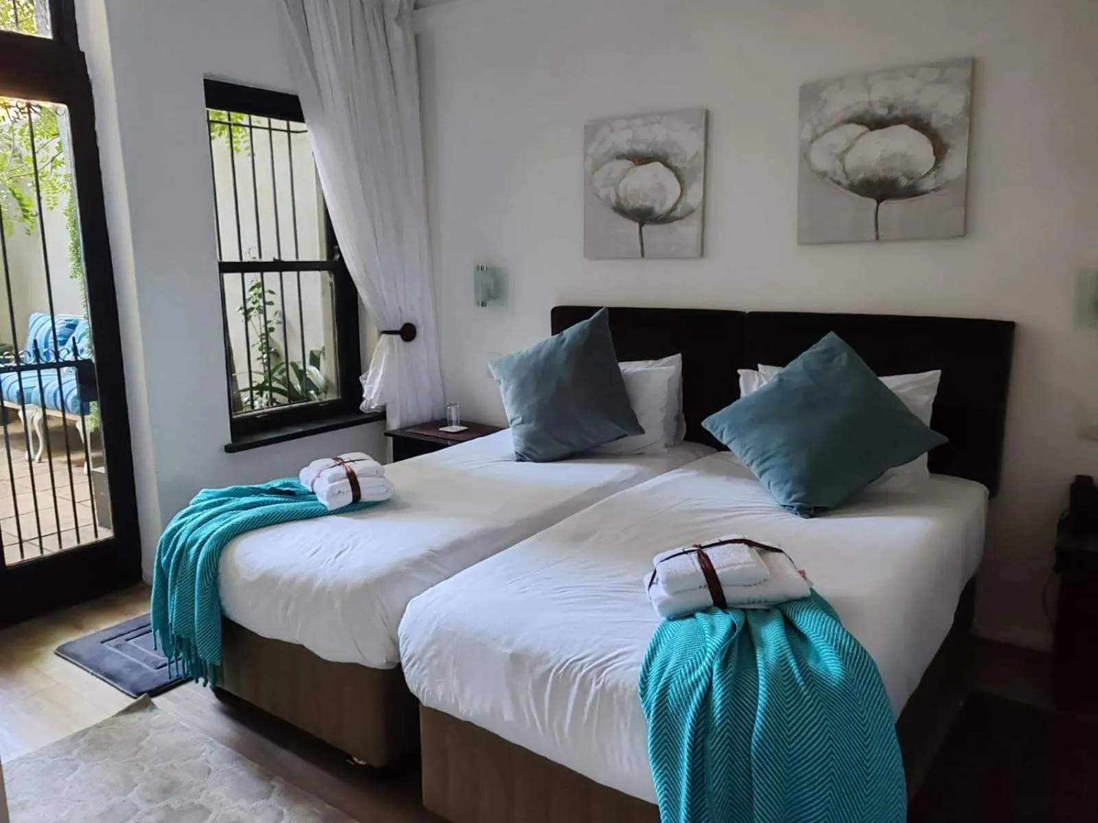 Shower, Bed in Point B Guest House -Sustainable Solar Energy