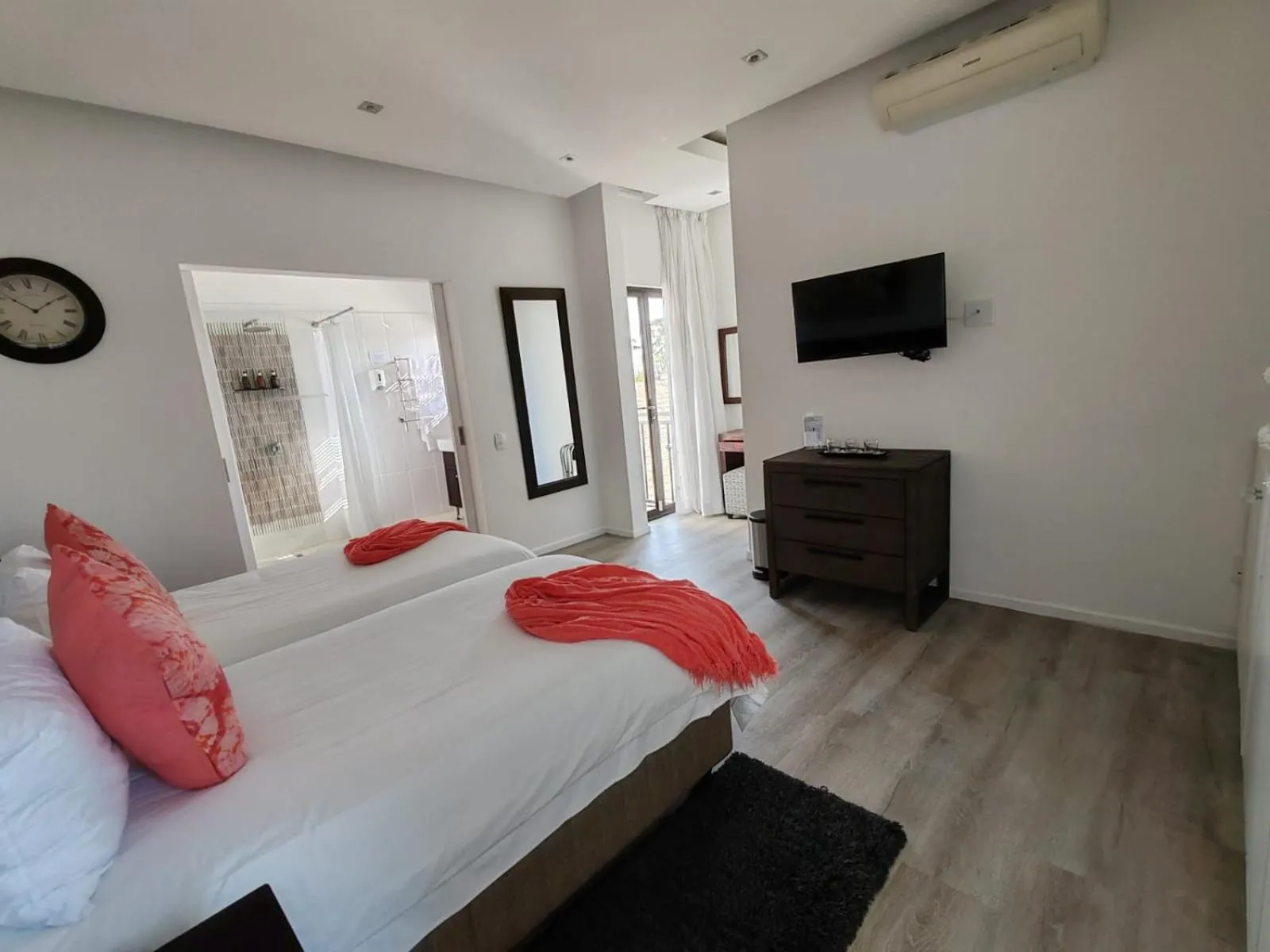 Shower, Bed in Point B Guest House -Sustainable Solar Energy