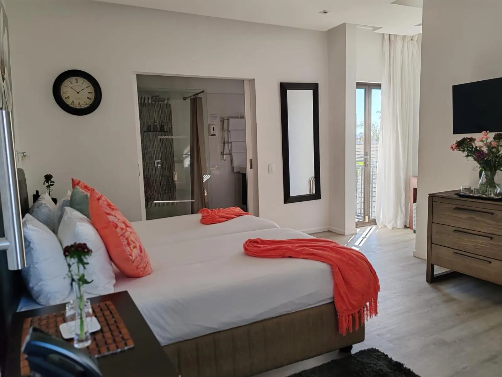 Bed in Point B Guest House -Sustainable Solar Energy