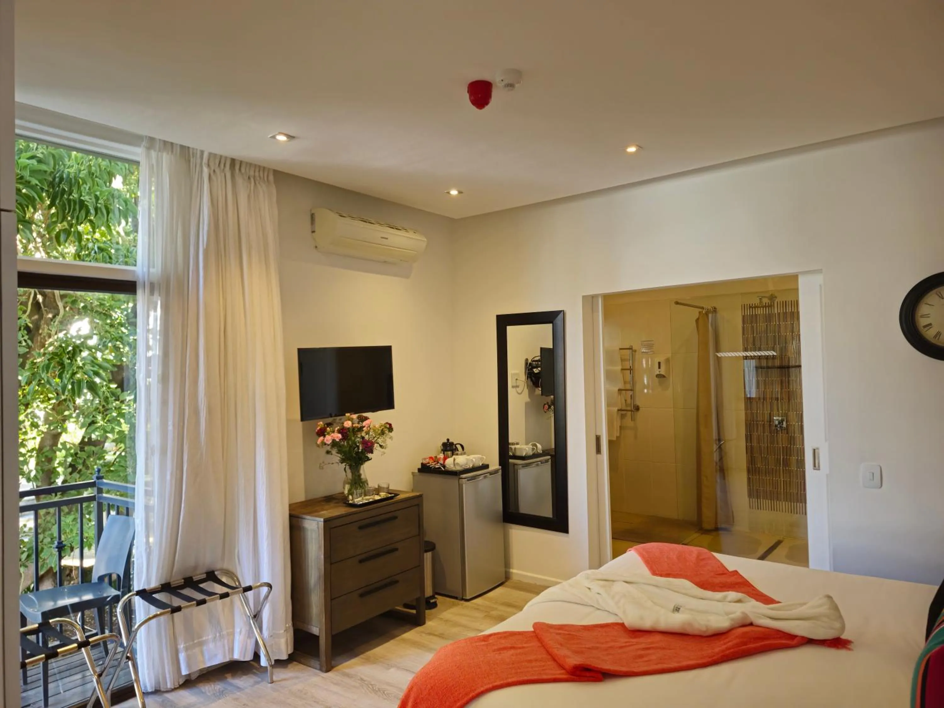 Bed in Point B Guest House -Sustainable Solar Energy