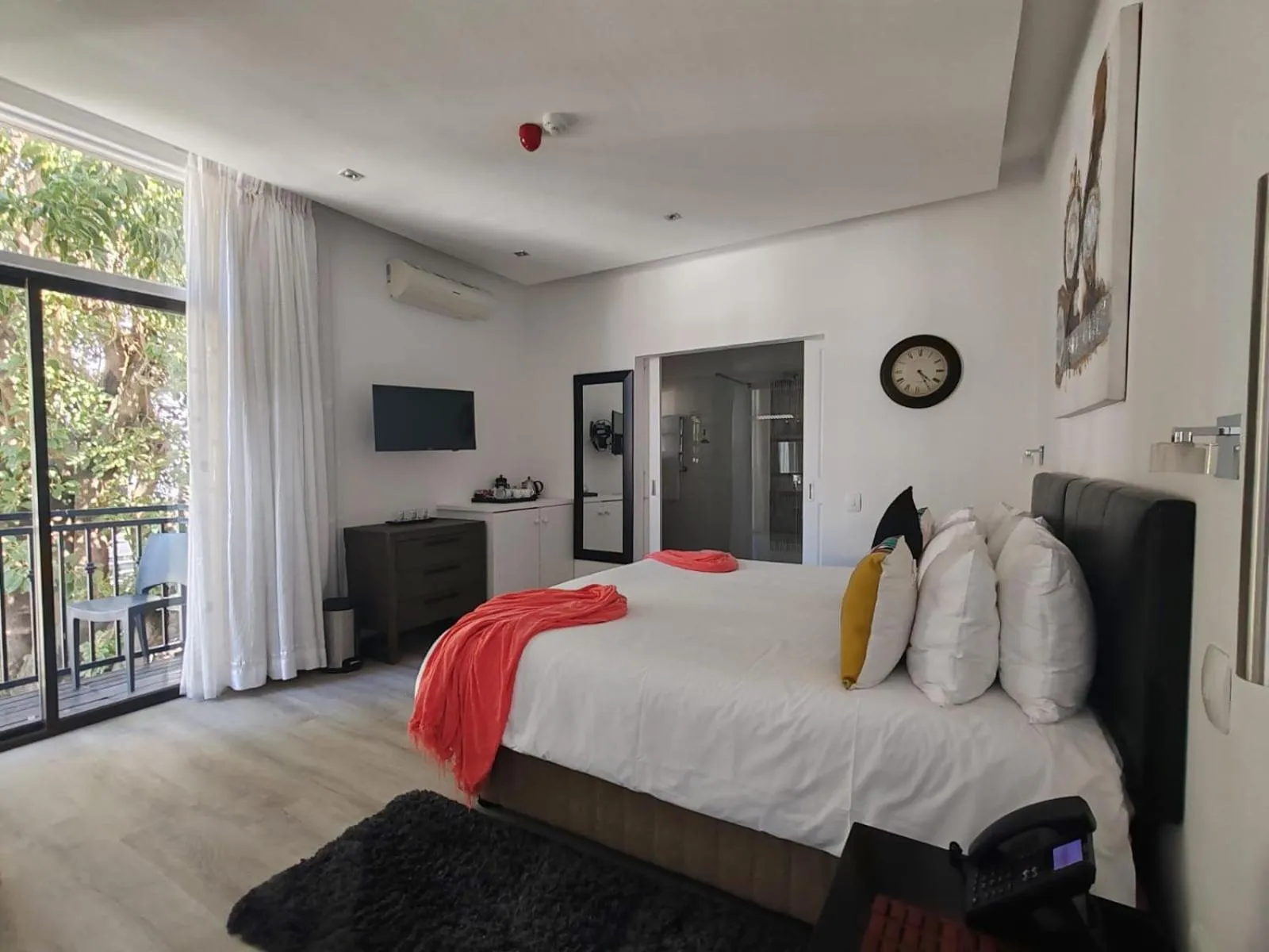 Bed in Point B Guest House -Sustainable Solar Energy