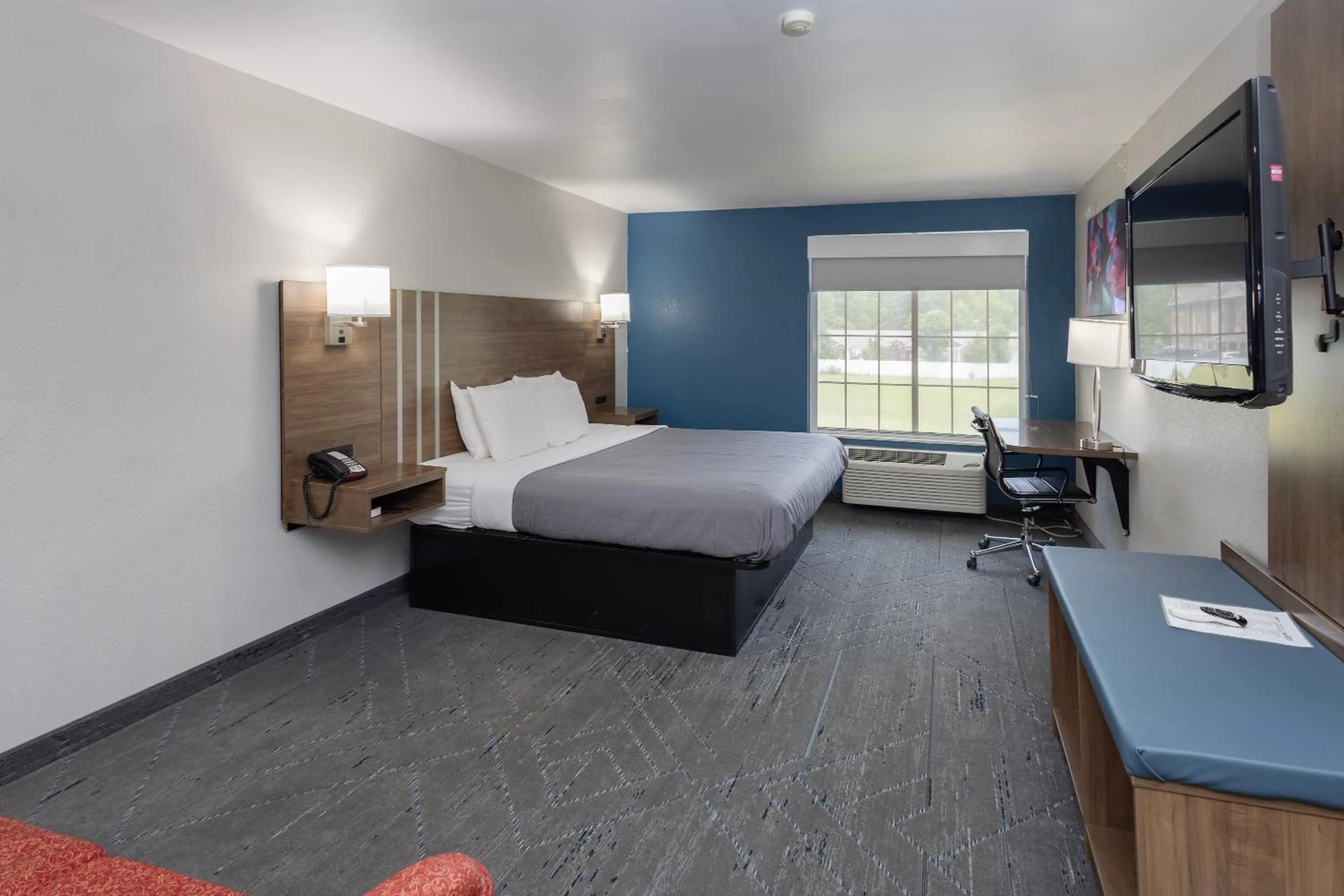 Photo of the whole room, Bed in Countryside Inn and Suites