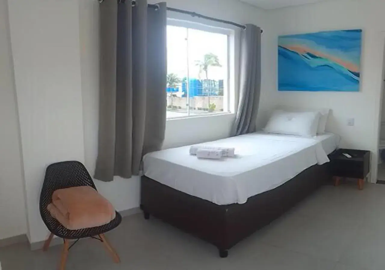Standard Single Room in Hotel Rosa da Ilha Guaruja - 80m do mar, 02 piscinas, sala de jogos, brinquedão de percurso para crianças Standard Single Room in Hotel Rosa da Ilha Guaruja - 80m do mar, 02 piscinas, sala de jogos, brinquedão de percurso para crianças
