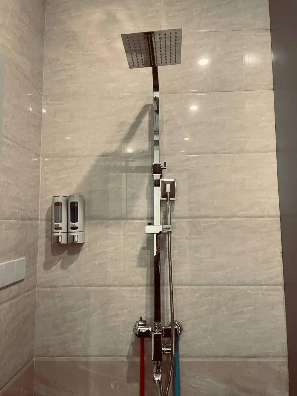 Shower in YAMA HOTEL & ROOFTOP BAR