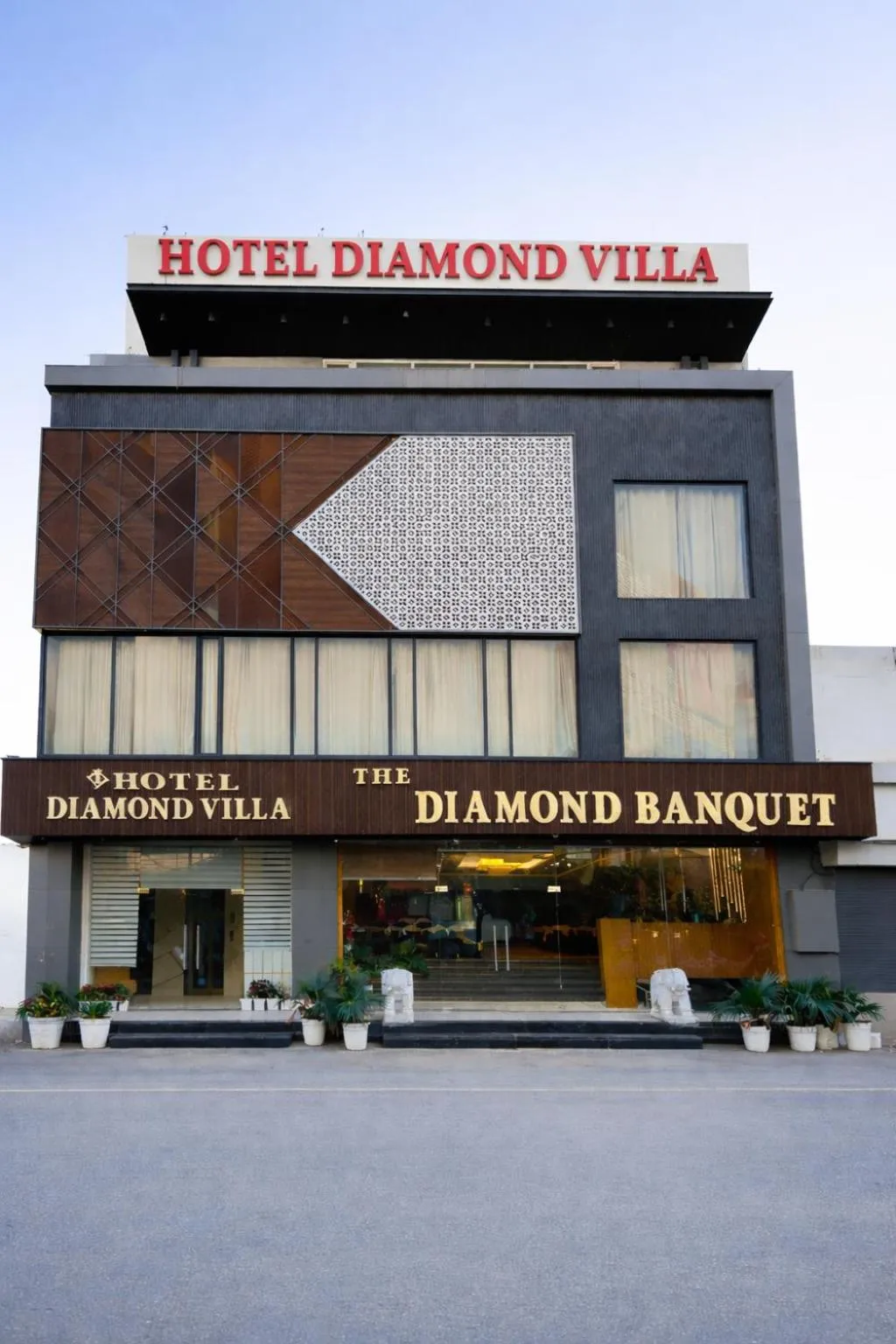 Property logo or sign in Hotel Diamond Villa and Banquet