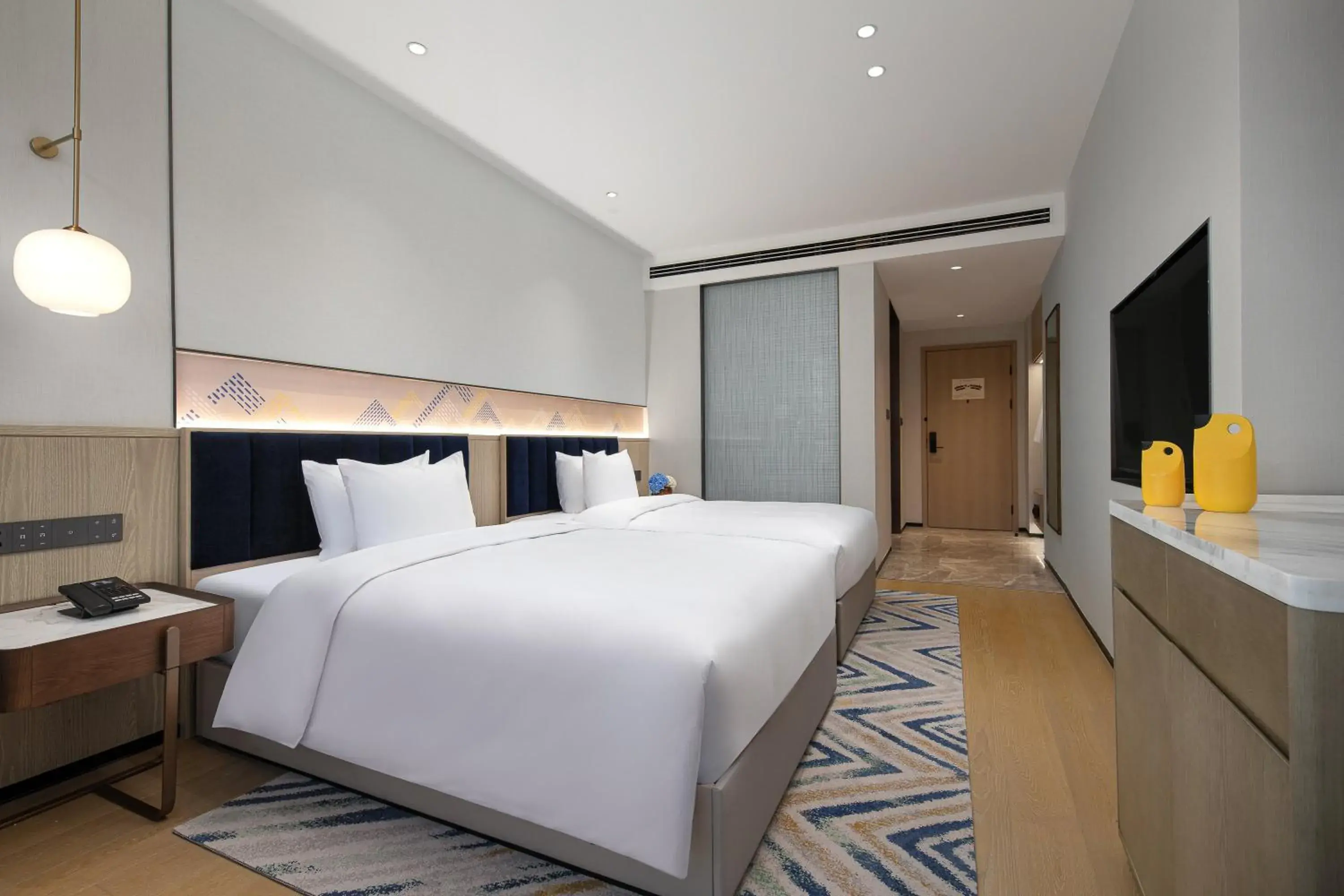 Standard Double Room with Two Double Beds in voco Lianyungang Haizhou Bay by IHG Standard Double Room with Two Double Beds in voco Lianyungang Haizhou Bay by IHG