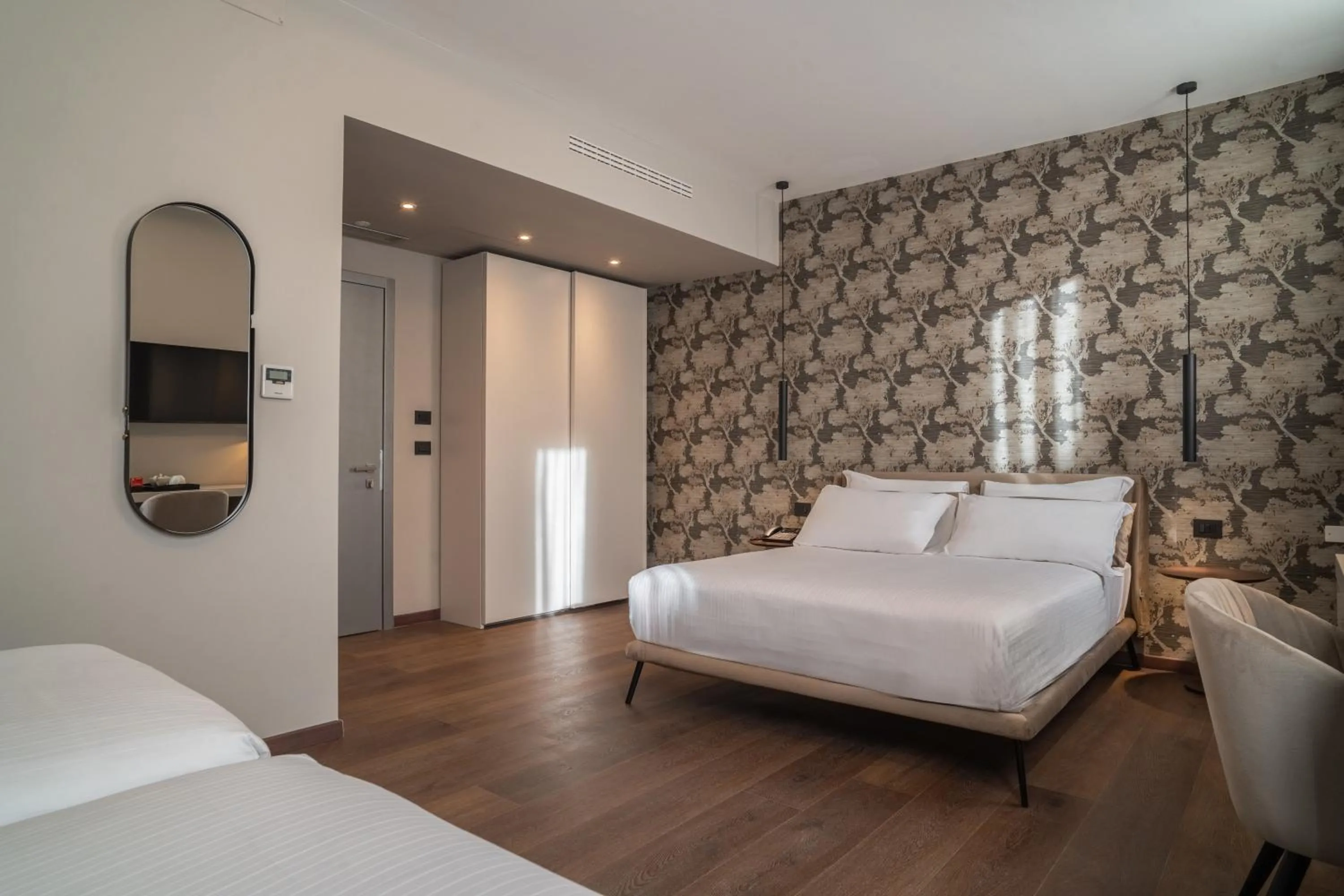 Classic Quadruple Room in Porpora Suite Hotel