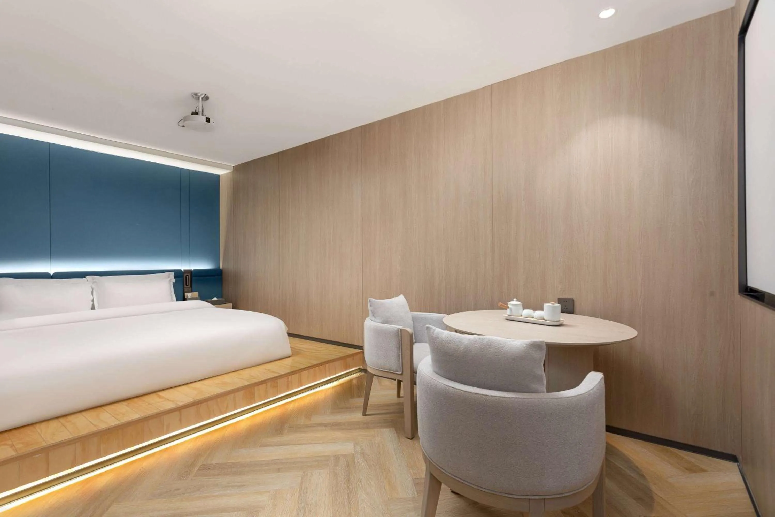 Photo of the whole room in Ramada Encore by Wyndham Wuhan Int'l Conference Center