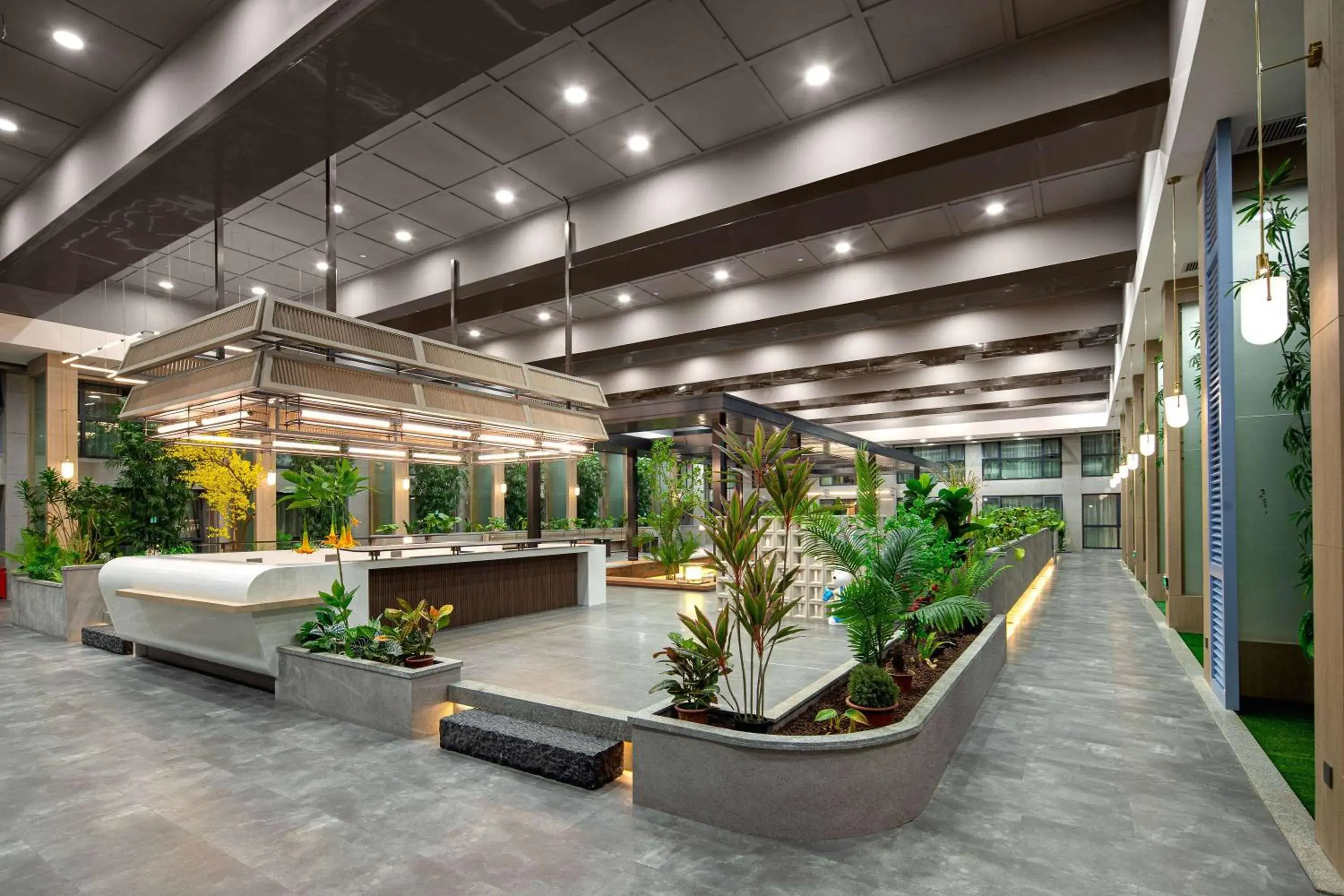 Lobby or reception in Ramada Encore by Wyndham Wuhan Int'l Conference Center Lobby or reception in Ramada Encore by Wyndham Wuhan Int'l Conference Center