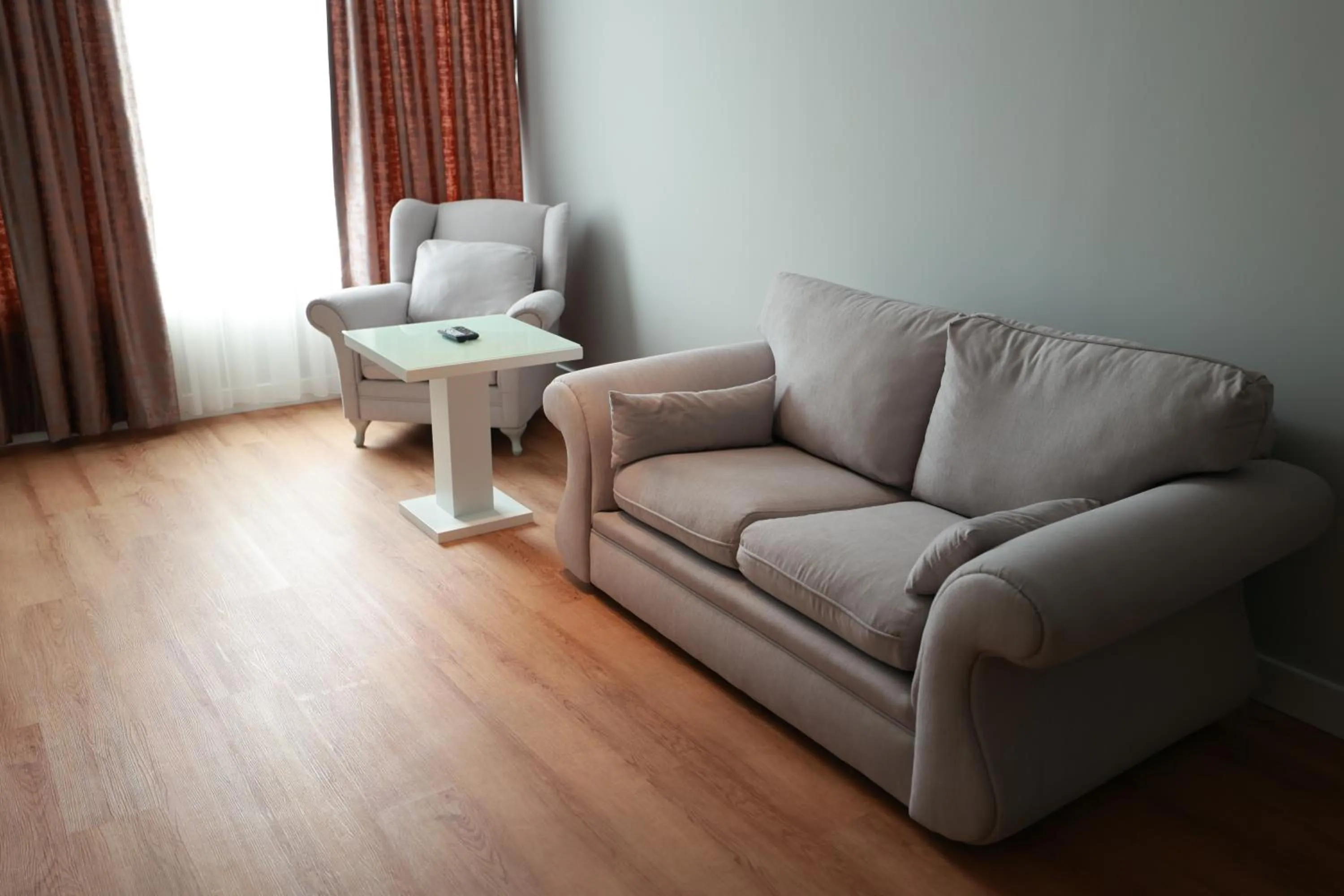 Seating area in Nova Plaza Orion Hotel