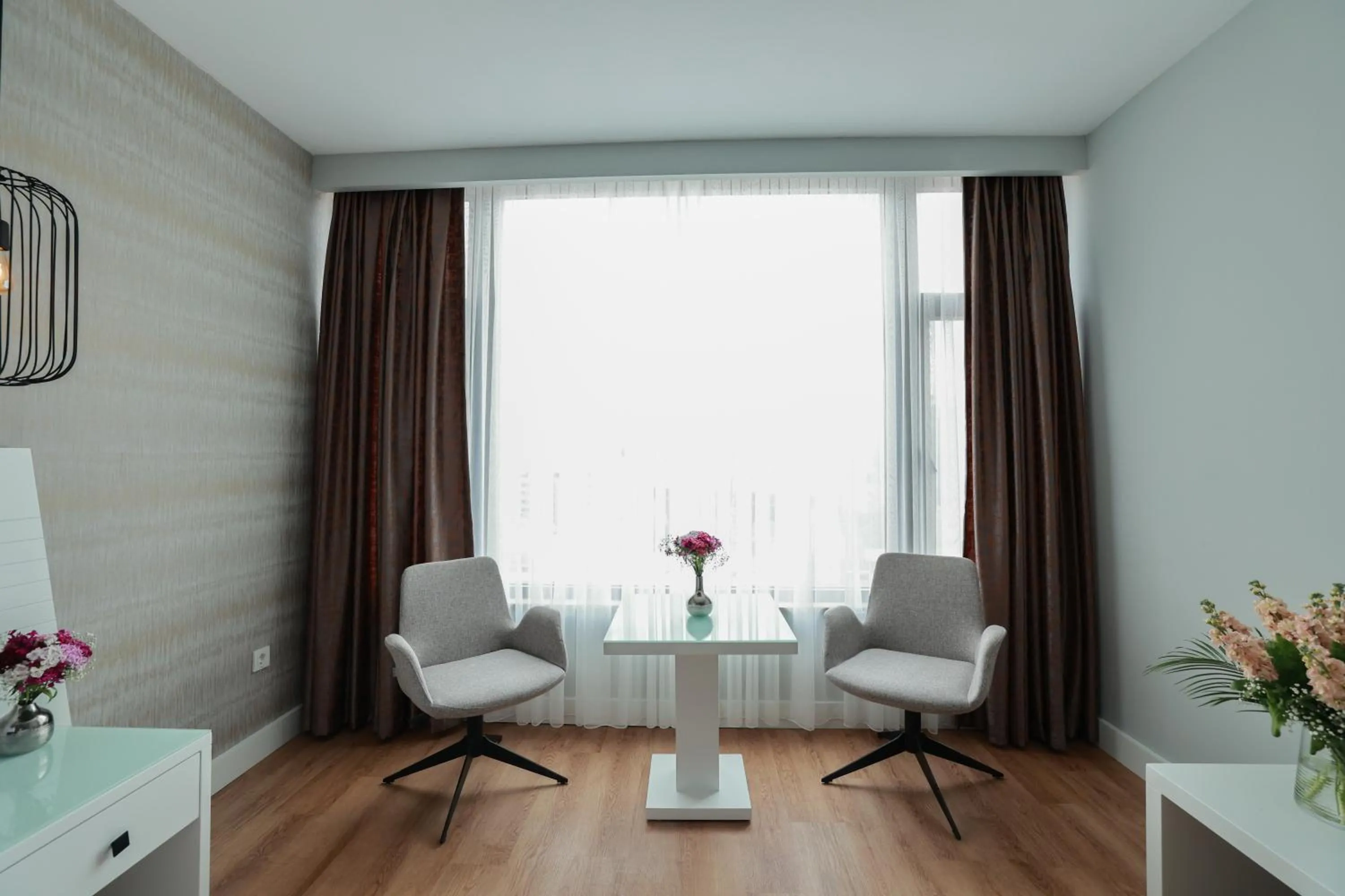 Seating area in Nova Plaza Orion Hotel