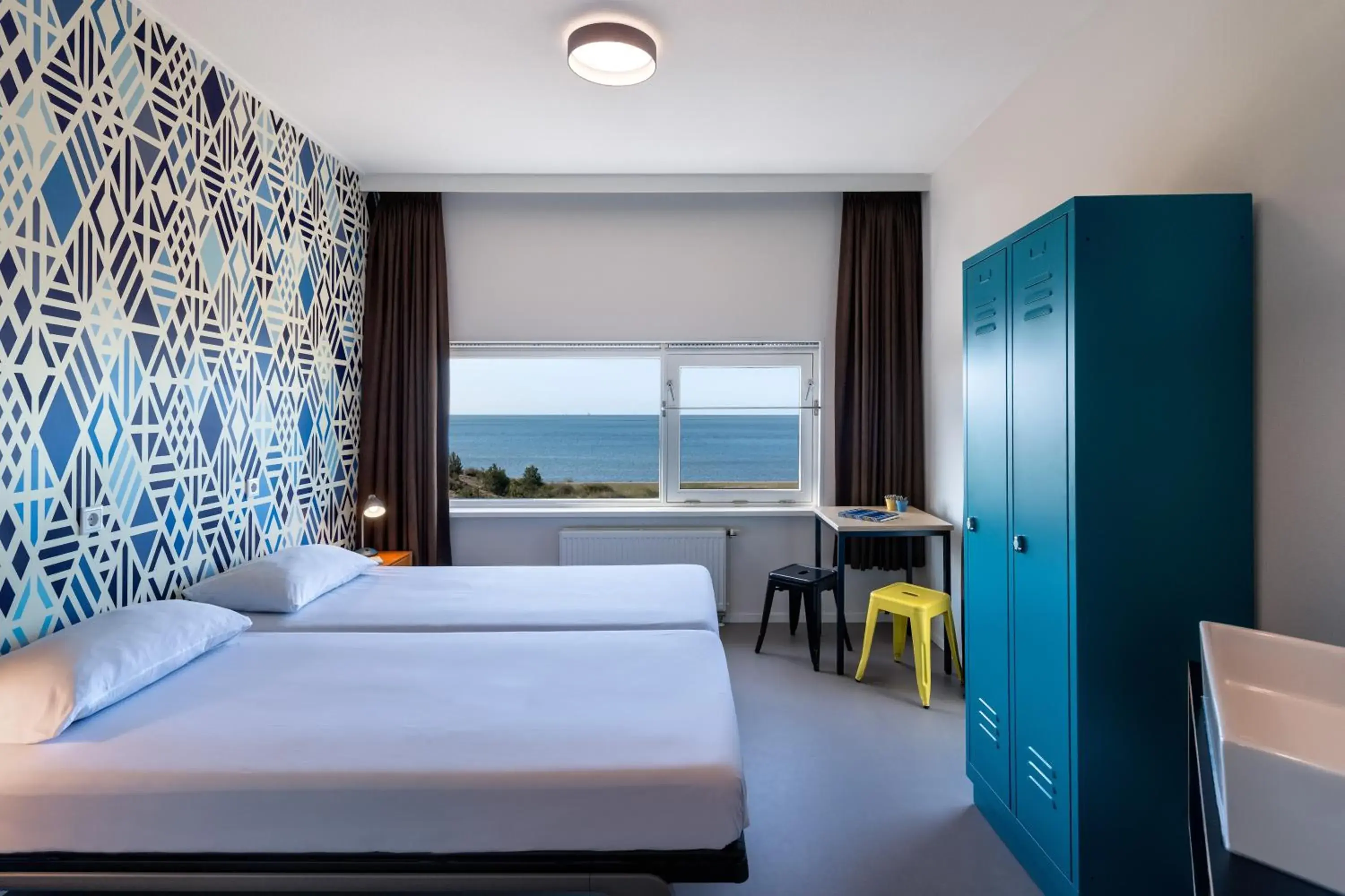 Comfort Double Room with Sea View and Private Bathroom with Shower in Stayokay Hostel Terschelling Comfort Double Room with Sea View and Private Bathroom with Shower in Stayokay Hostel Terschelling