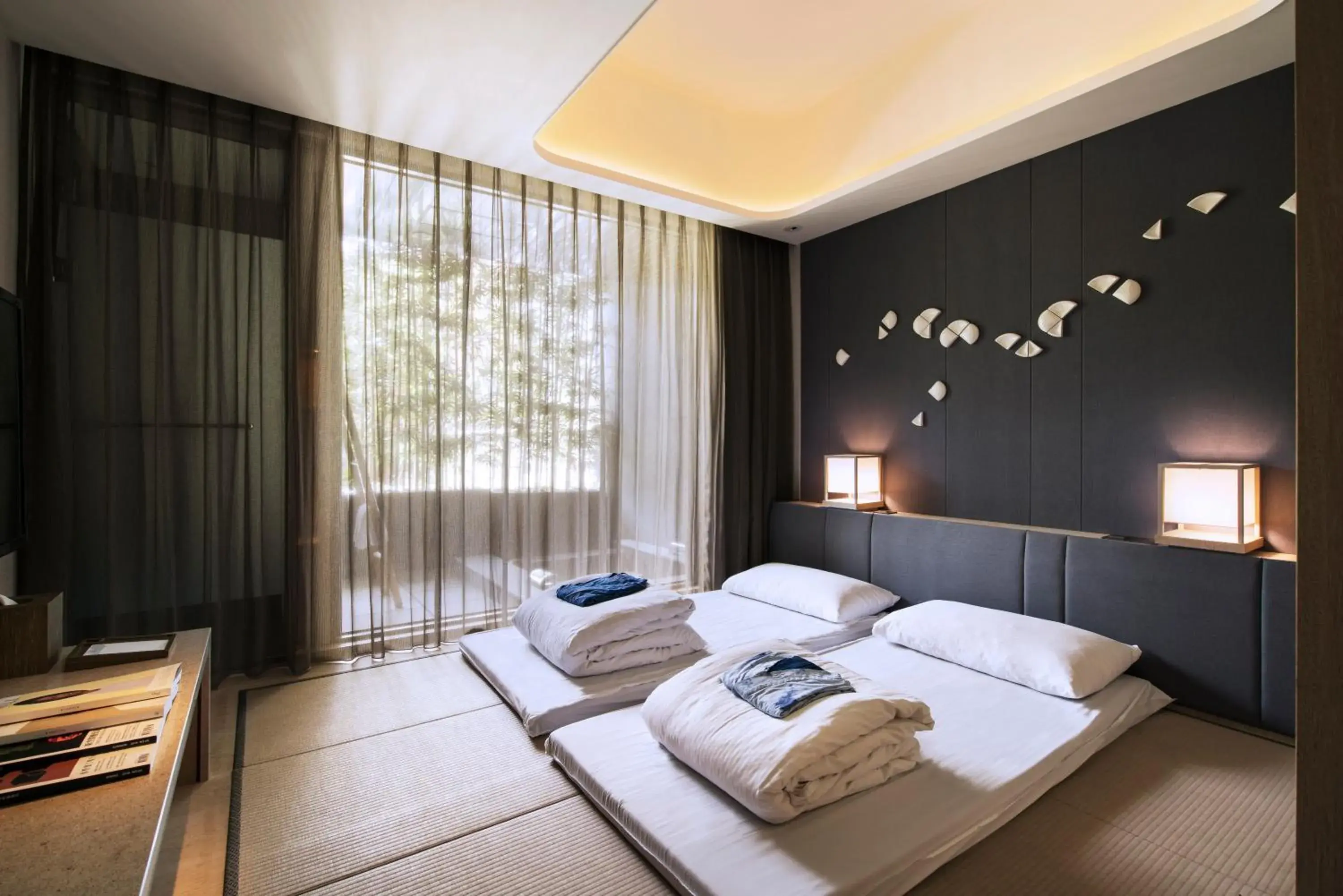 Bed in 礁溪晶泉丰旅 Wellspring by Silks Jiaoxi Bed in 礁溪晶泉丰旅 Wellspring by Silks Jiaoxi