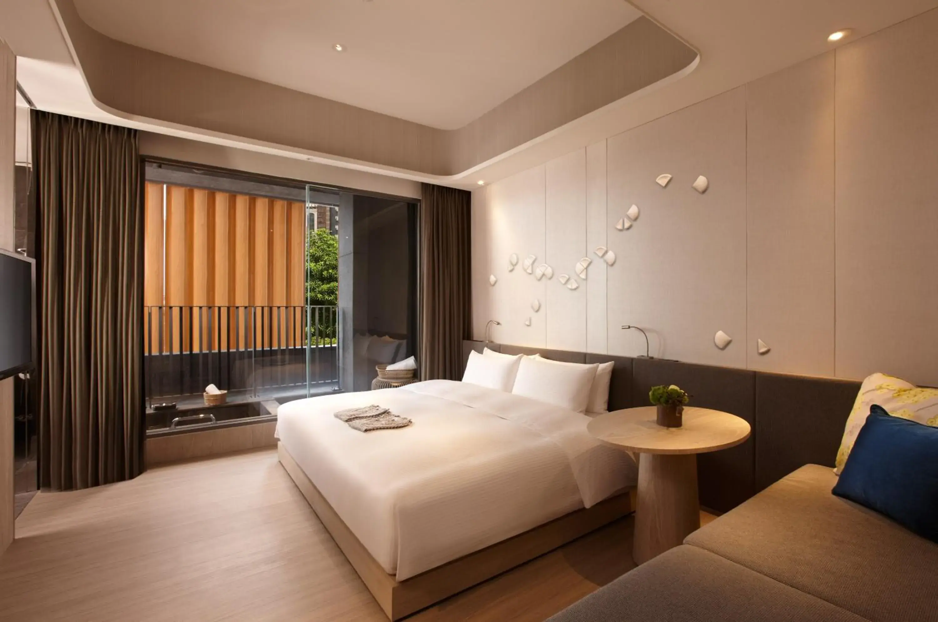 Bed in 礁溪晶泉丰旅 Wellspring by Silks Jiaoxi Bed in 礁溪晶泉丰旅 Wellspring by Silks Jiaoxi