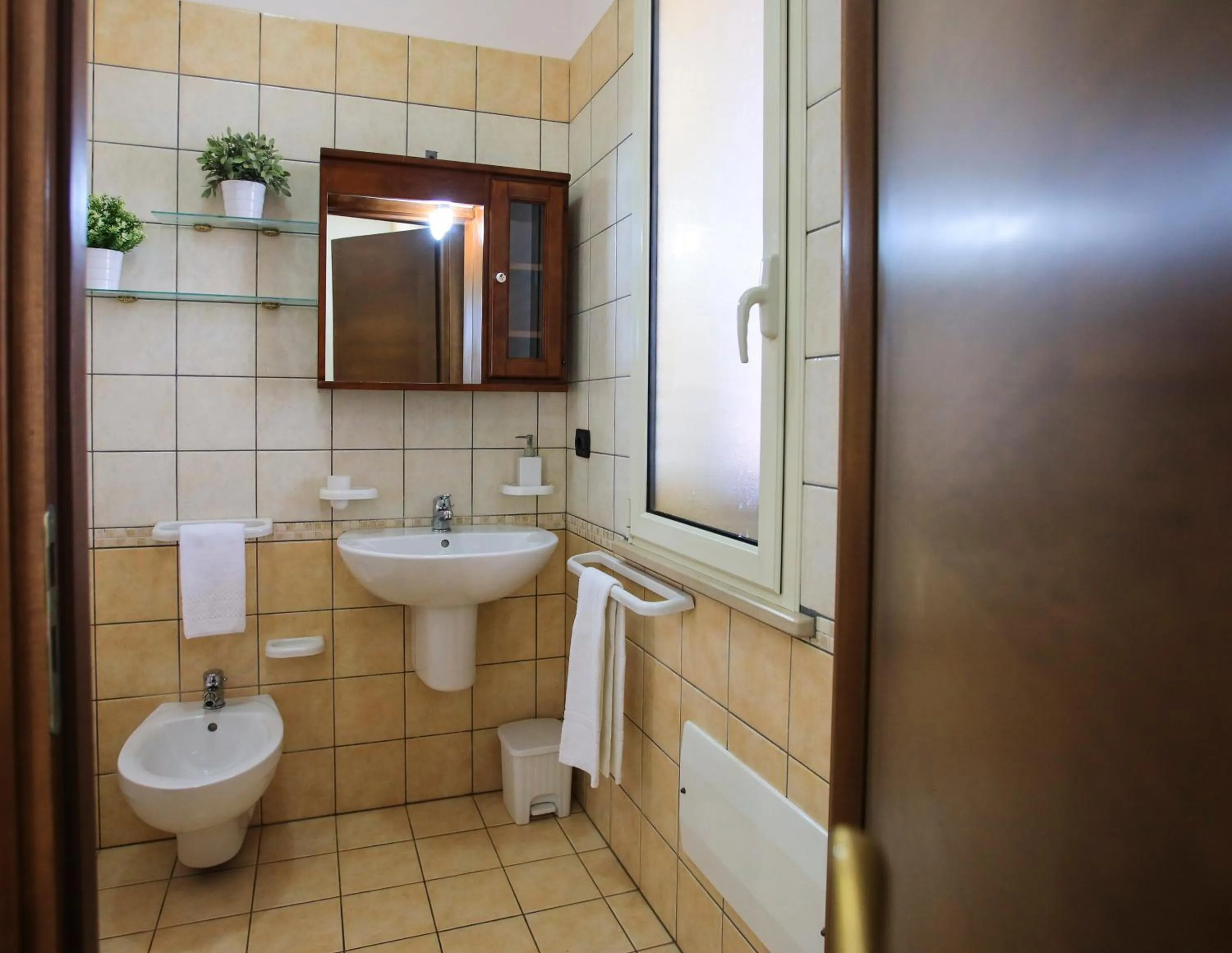 Bathroom in Il Baiocco affittacamere piscina & SPA